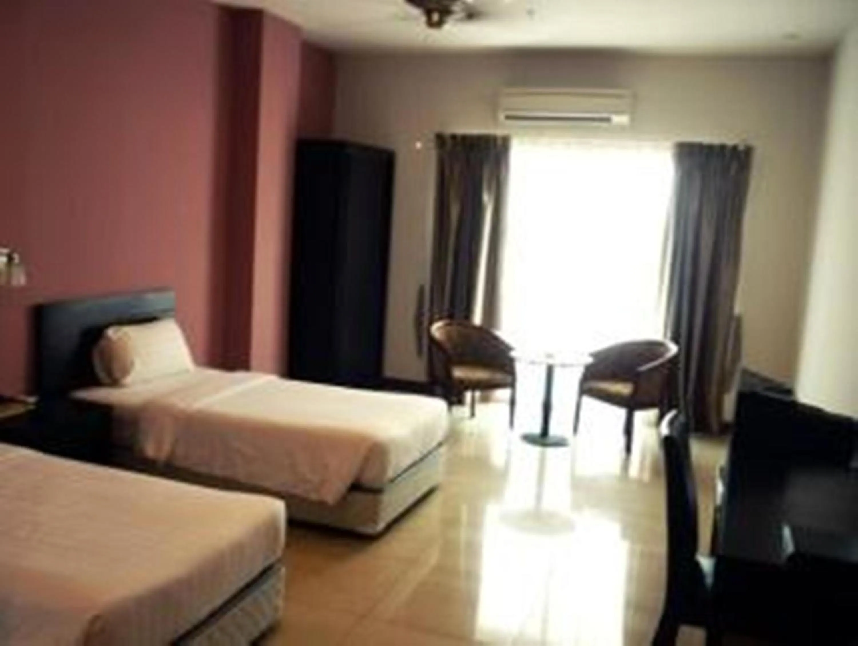 Bedroom in Tower Regency Hotel & Apartments
