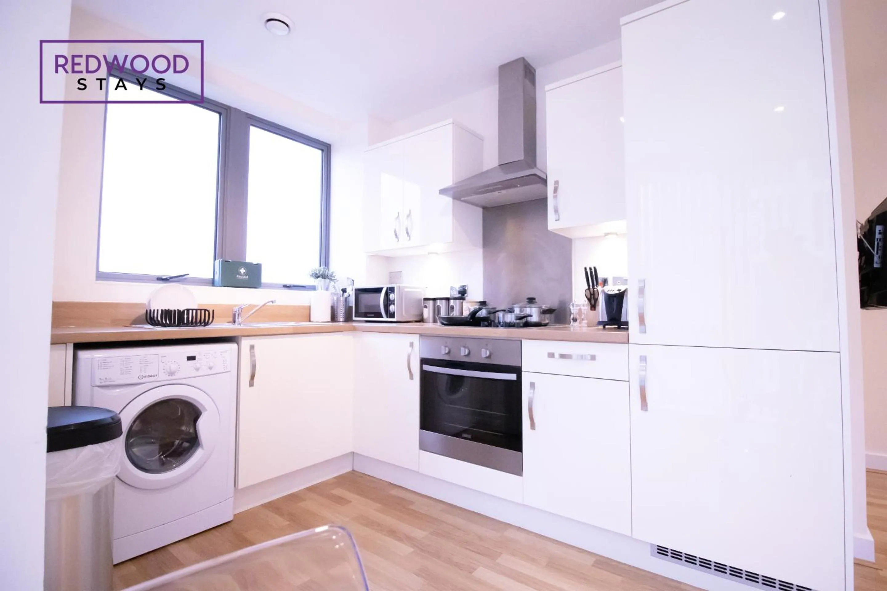 Kitchen or kitchenette in Festival Place, Modern Town Center Apartment, Perfect for Contractors & Families, FREE Parking & WiFi by REDWOOD STAYS