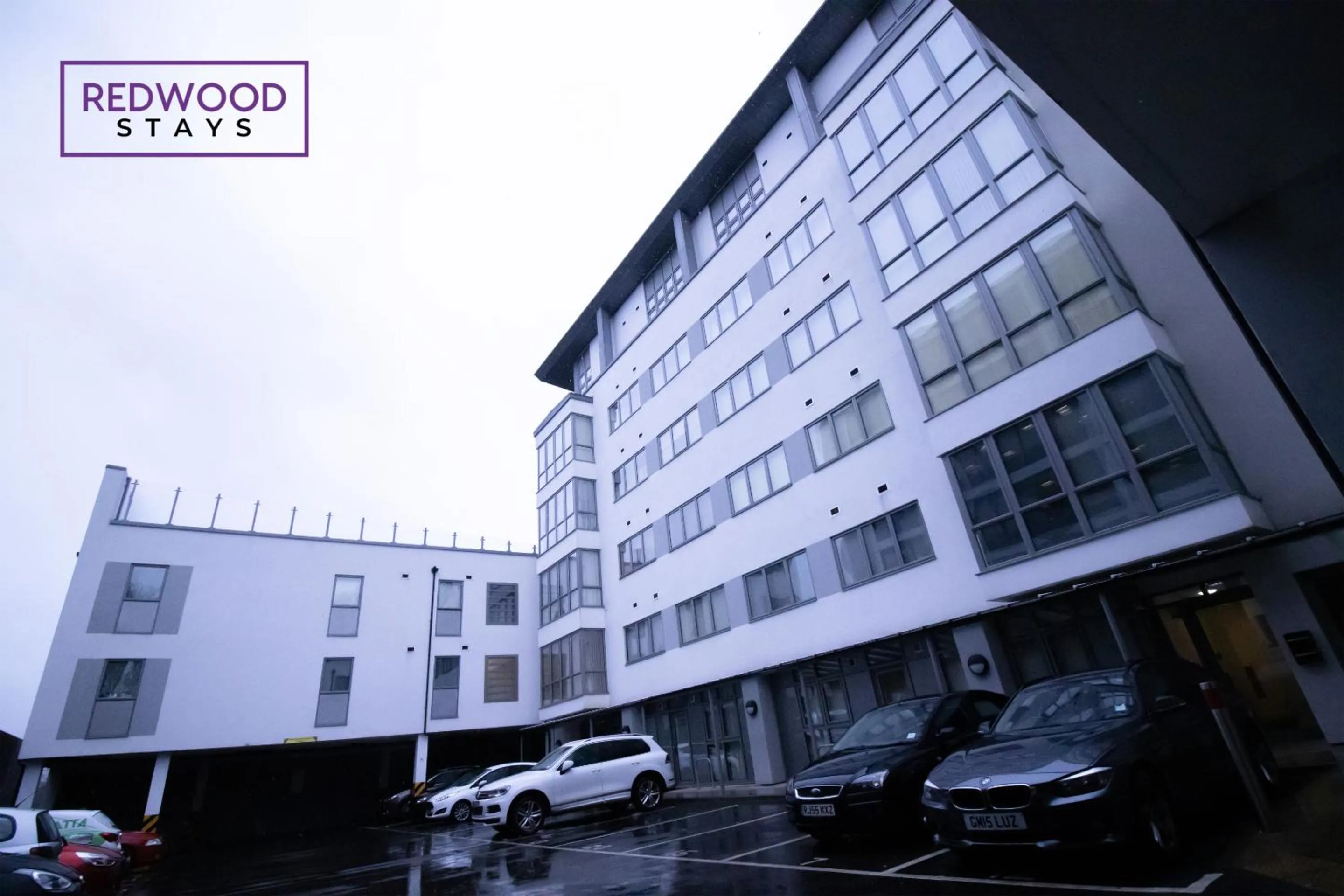 Property building in Festival Place, Modern Town Center Apartment, Perfect for Contractors & Families, FREE Parking & WiFi by REDWOOD STAYS