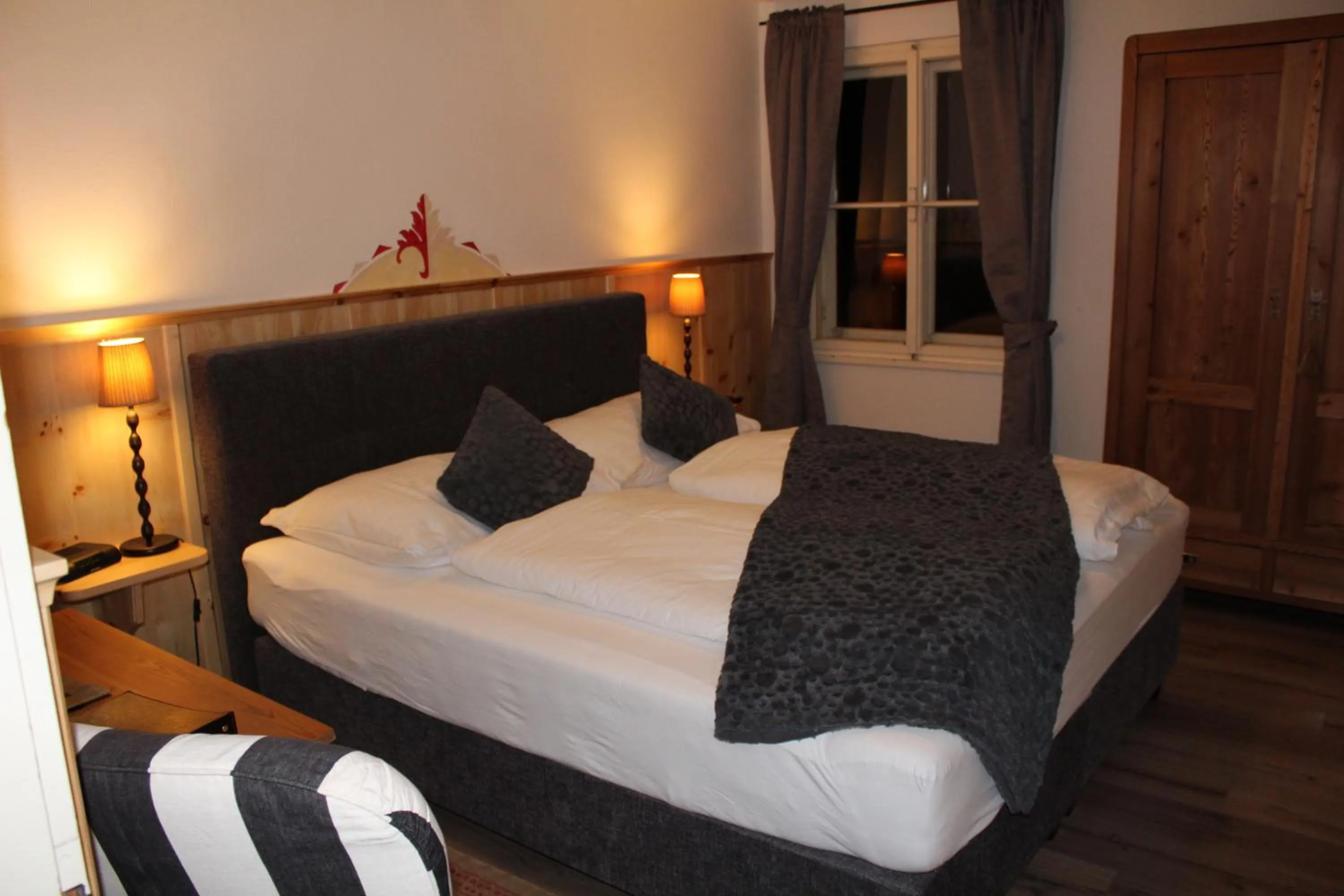 Photo of the whole room, Bed in Hotel Schlosswirt