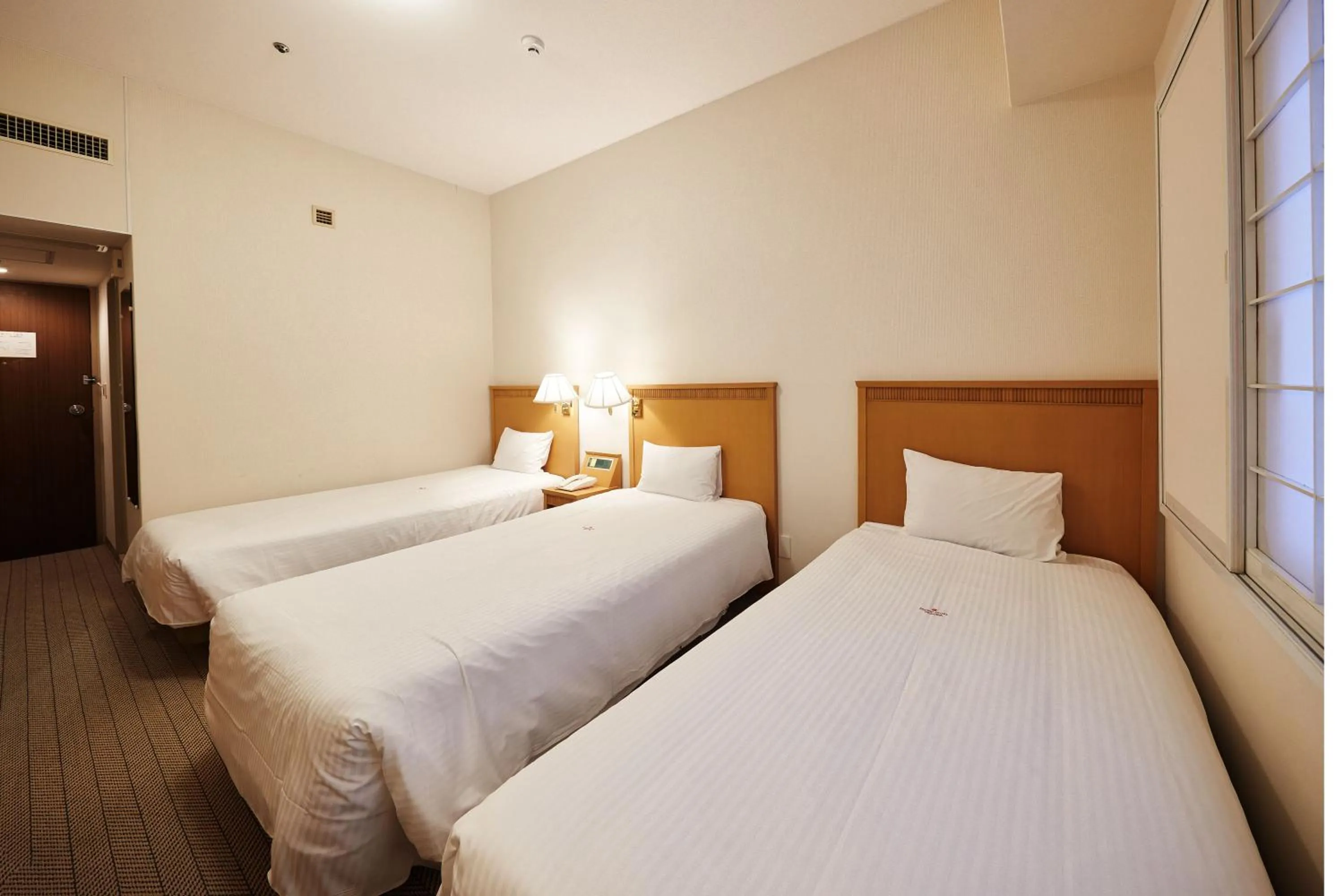 Photo of the whole room, Bed in Pacific Hotel Okinawa