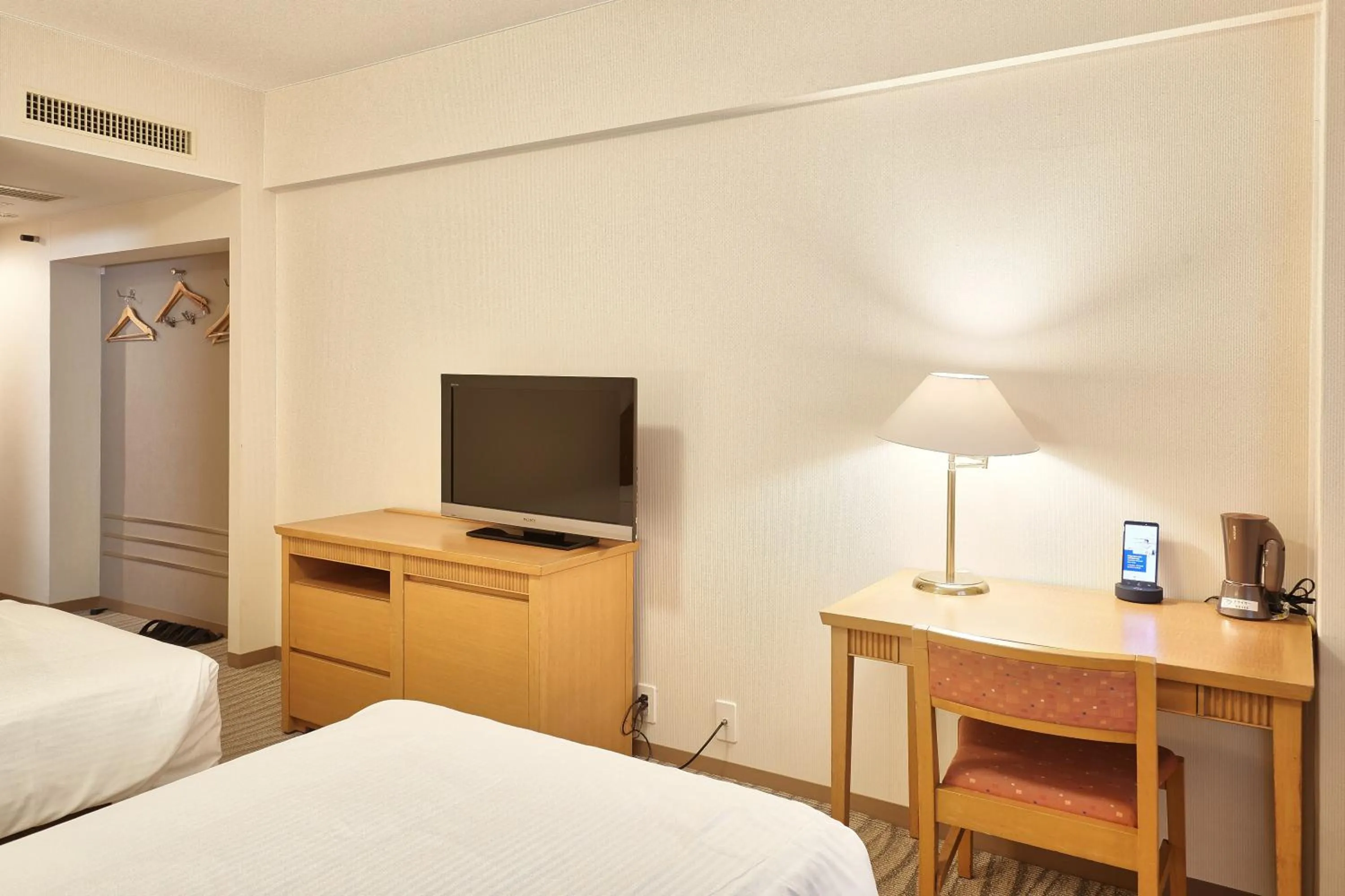 Photo of the whole room, Bed in Pacific Hotel Okinawa