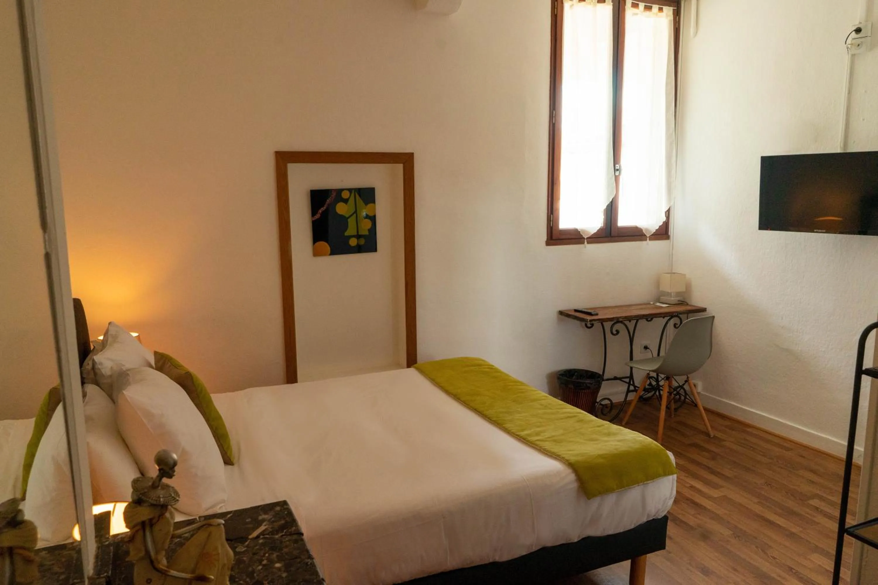 Bed in Hôtel Croix Baragnon