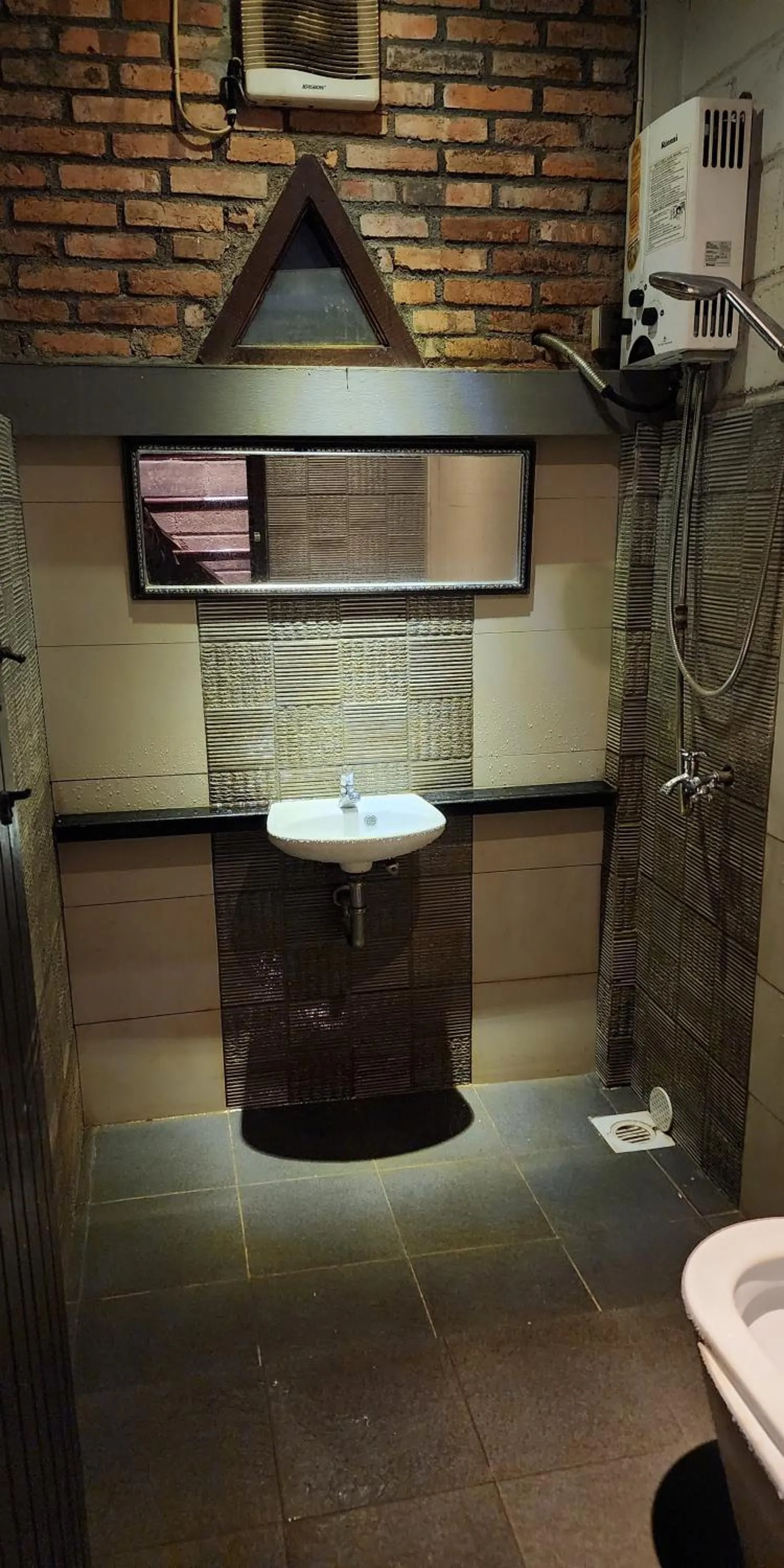 Bathroom in NILA HOUSE, Sharia Family Home Stay