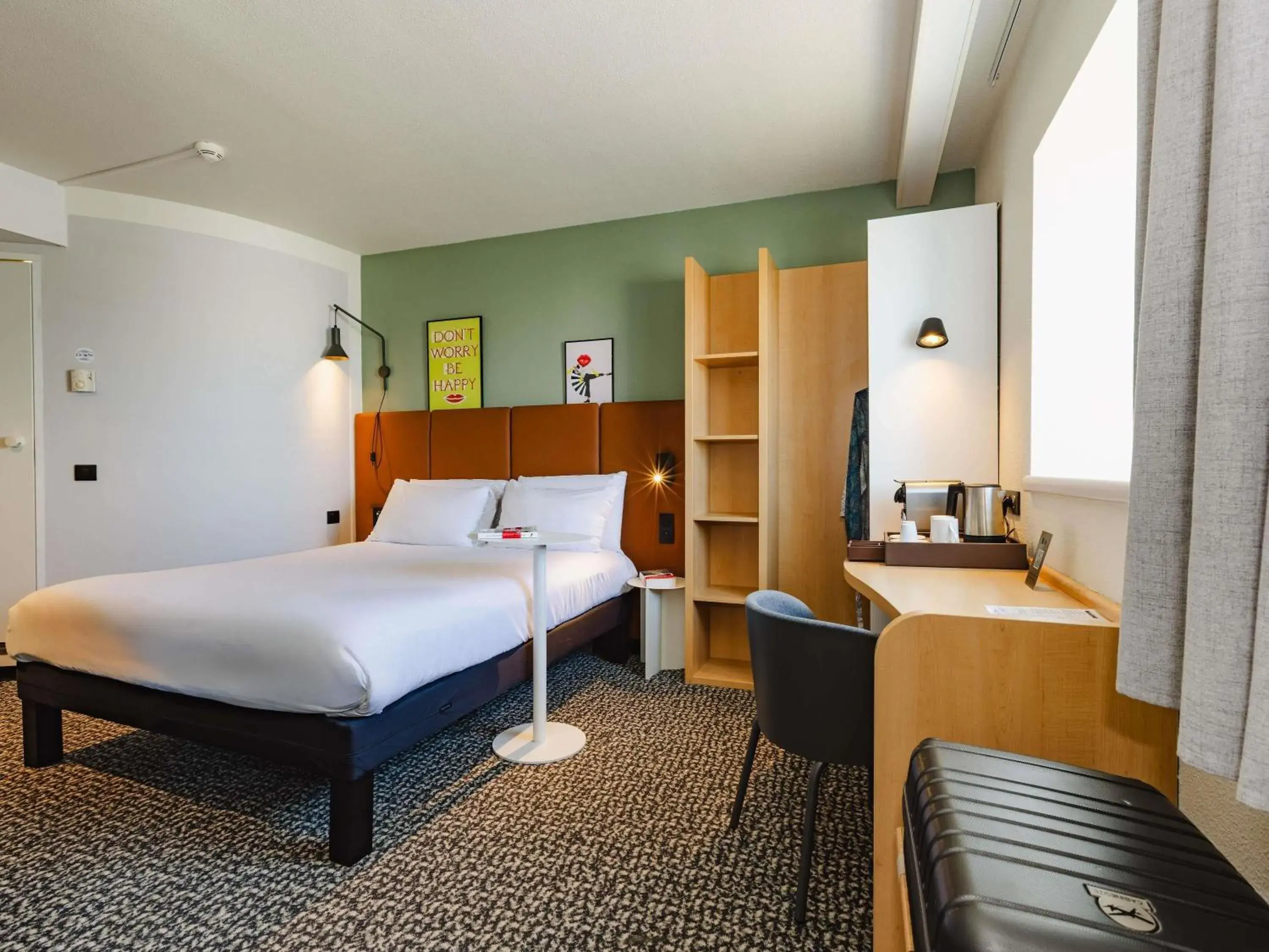 Comfort Room with Double Bed and Two Single Sofa Beds in Hotel ibis Rennes Centre Gare Sud Comfort Room with Double Bed and Two Single Sofa Beds in Hotel ibis Rennes Centre Gare Sud