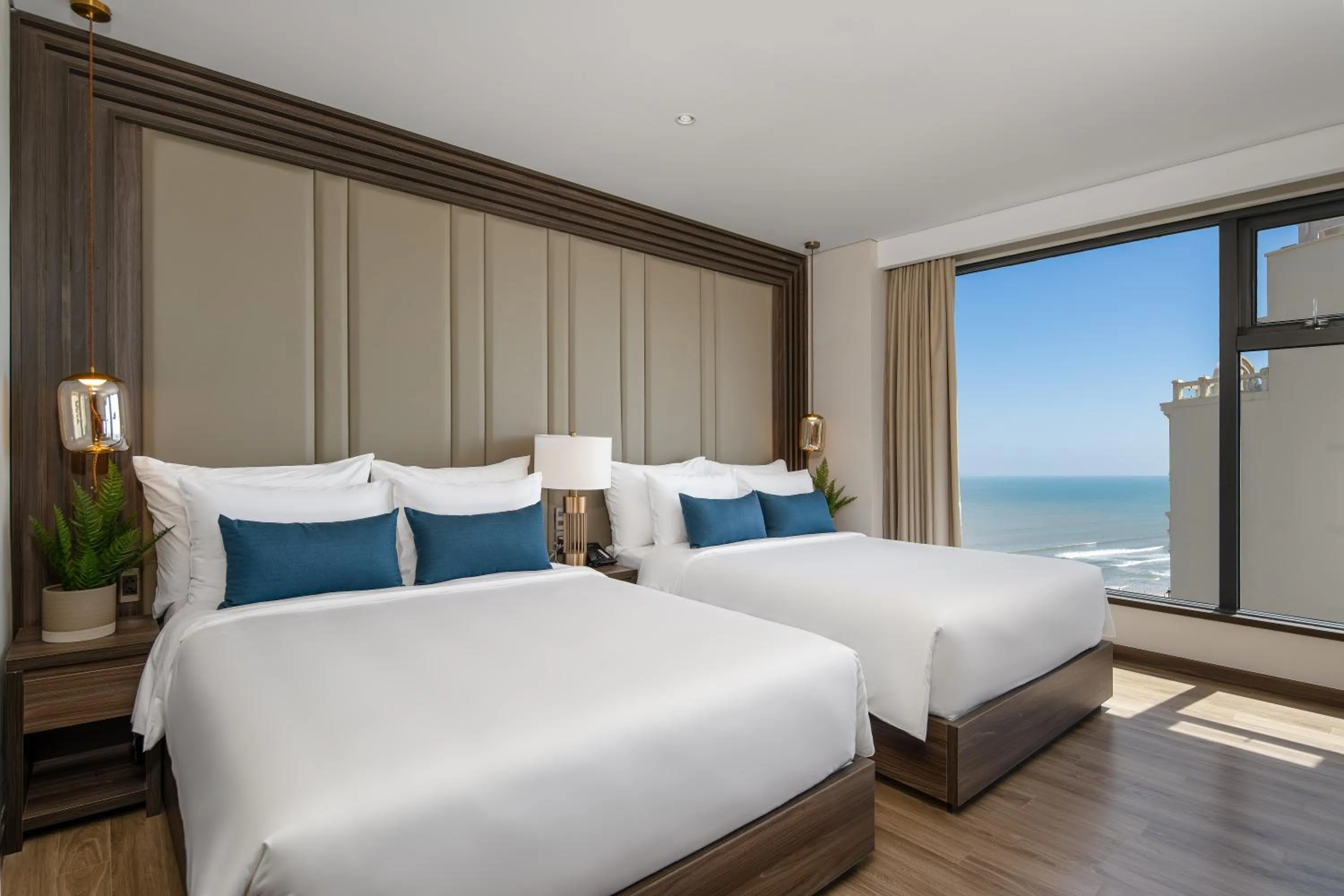 Bed in Minh Toan SAFI Ocean Hotel