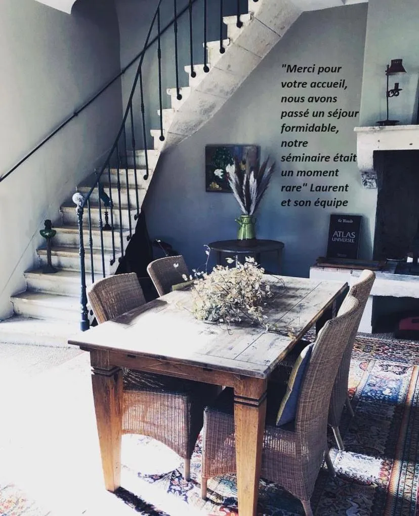 Communal lounge/ TV room in Hôtel de Mirmande