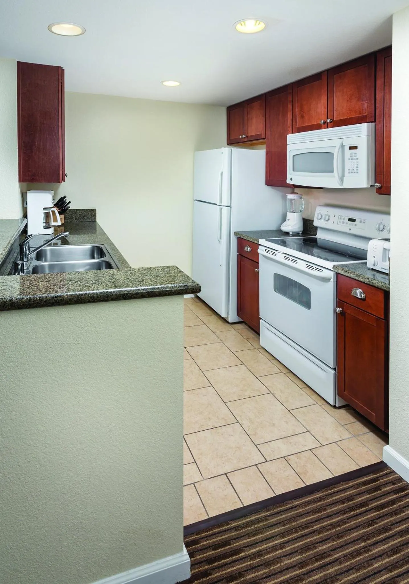 Kitchen or kitchenette in Club Wyndham Oceanside Pier Resort