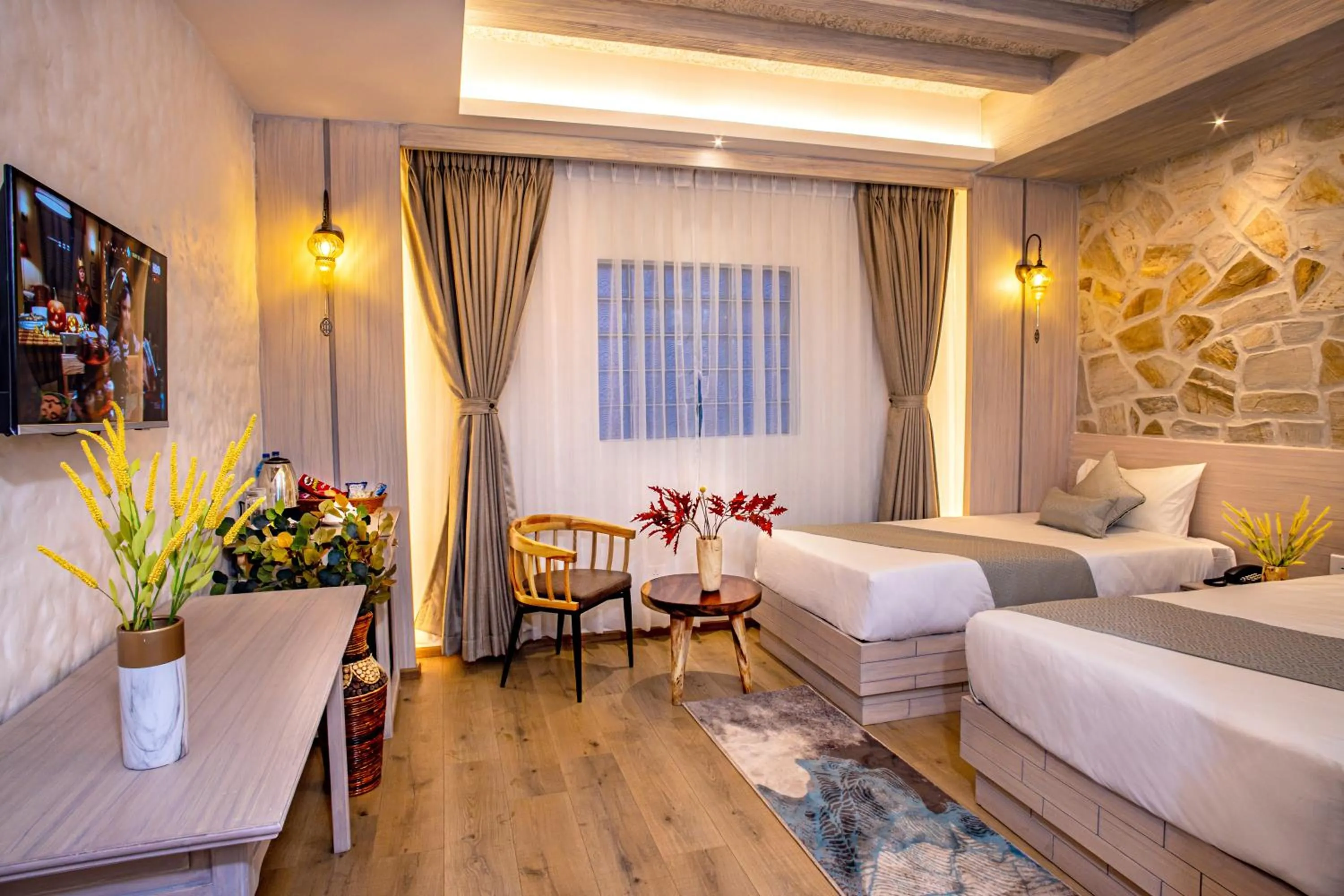 Seating area, Bed in Arushi Boutique Hotel