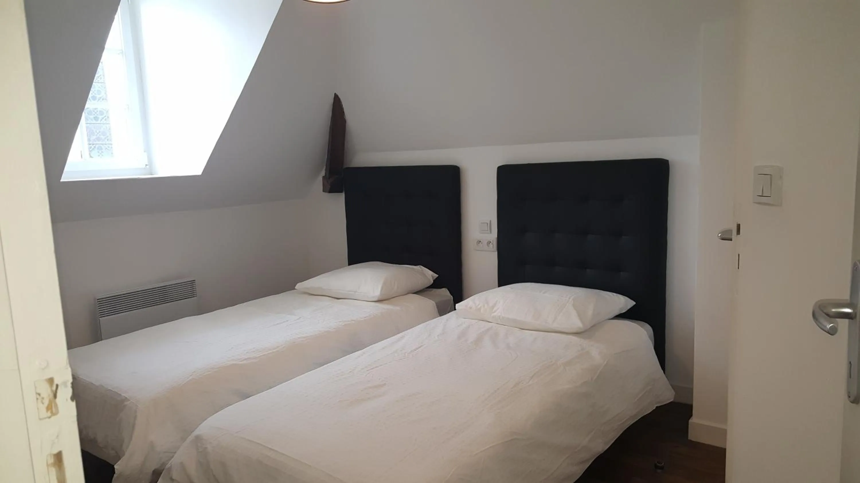 Bed in Au Pigeon Blanc