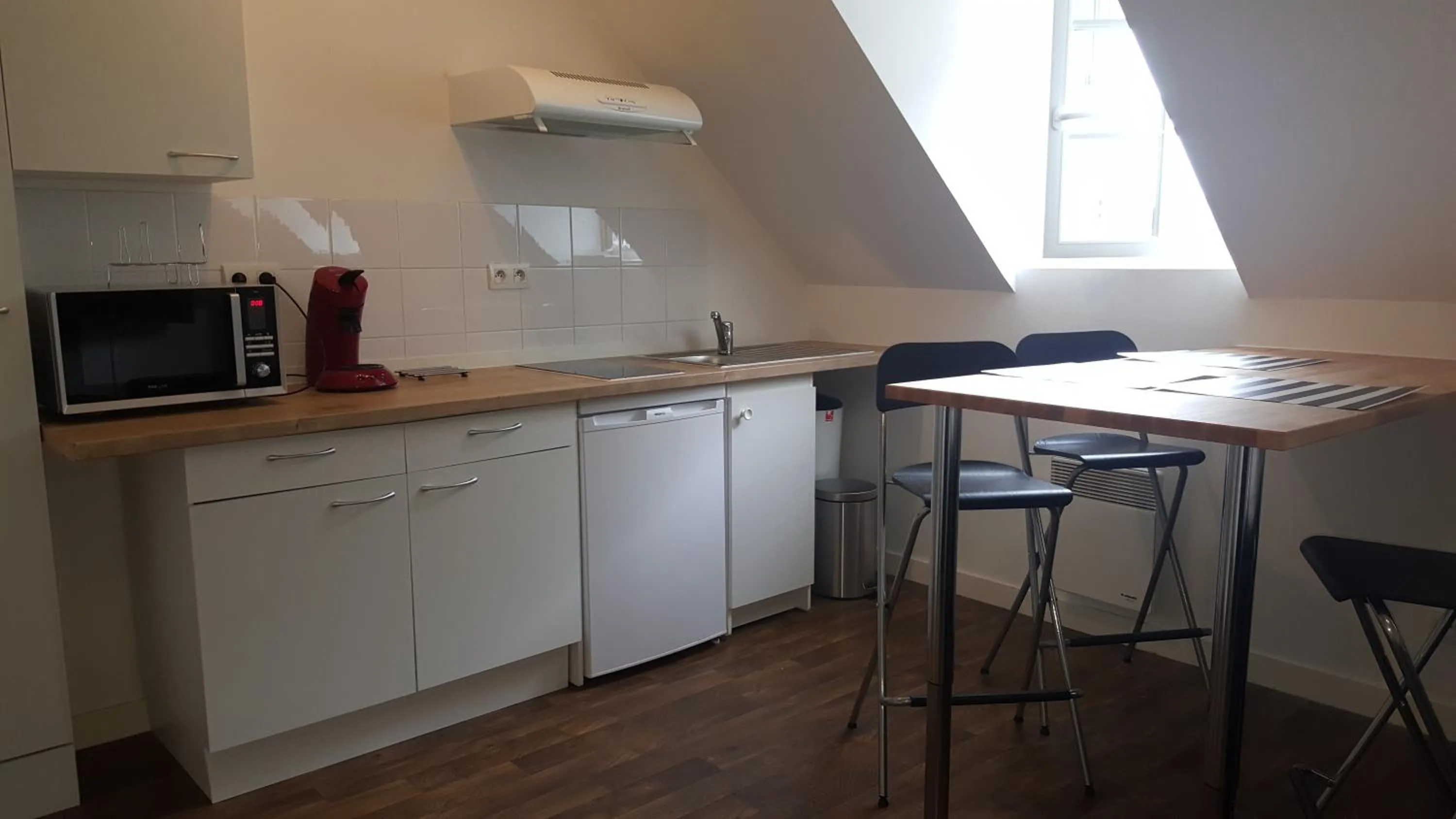 Kitchen or kitchenette in Au Pigeon Blanc