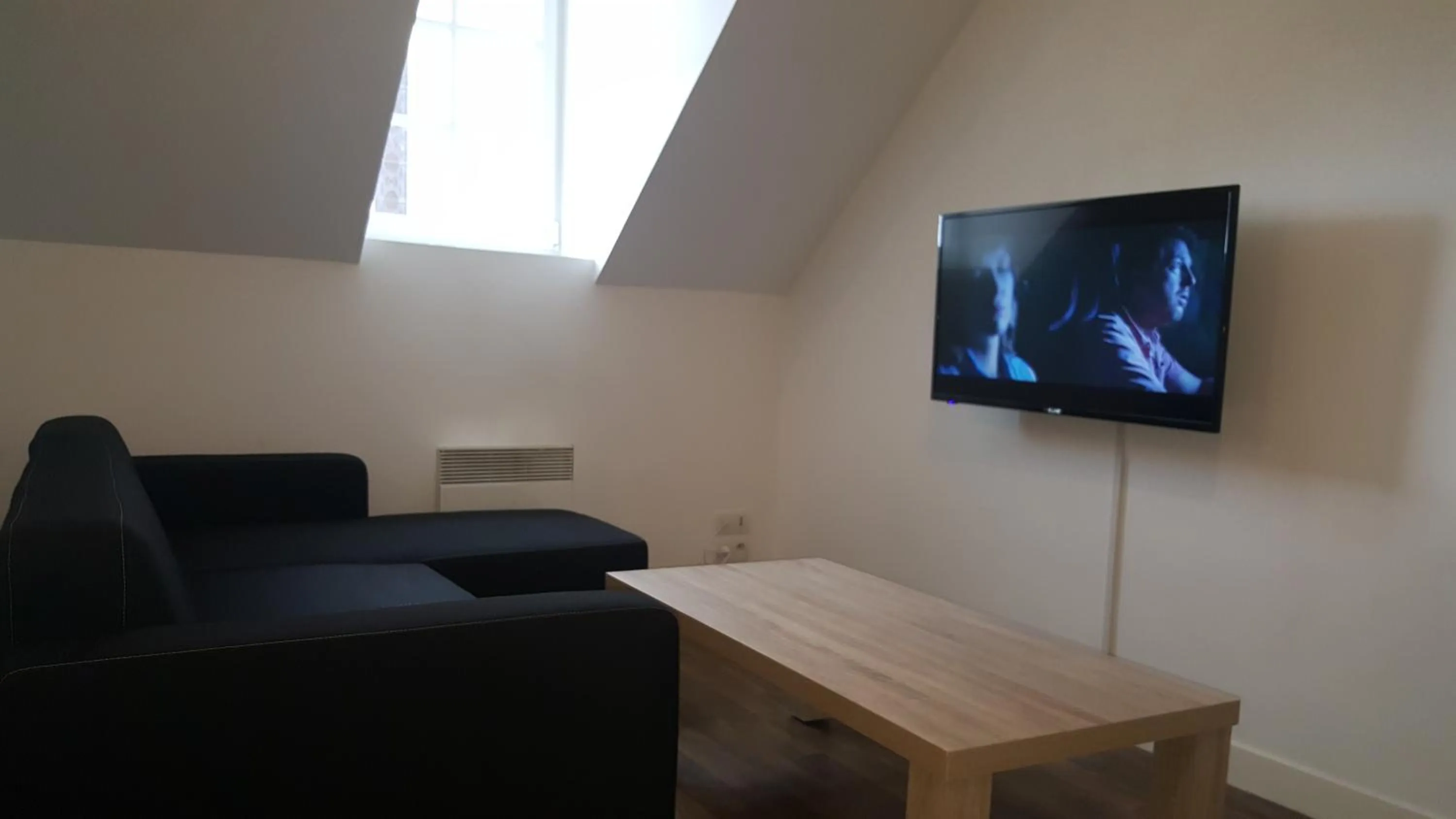 Living room in Au Pigeon Blanc