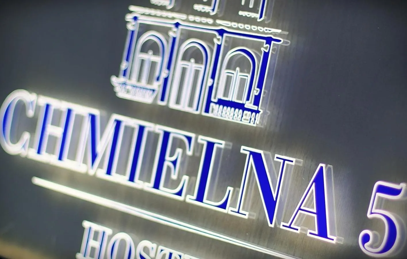 Property logo or sign in Chmielna 5 Rooms & Apartments