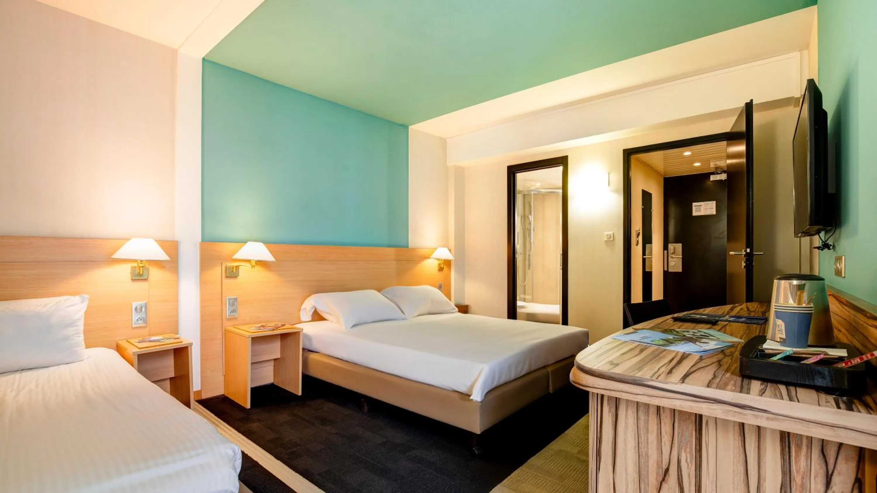 Bed in Kyriad Montbeliard Sochaux