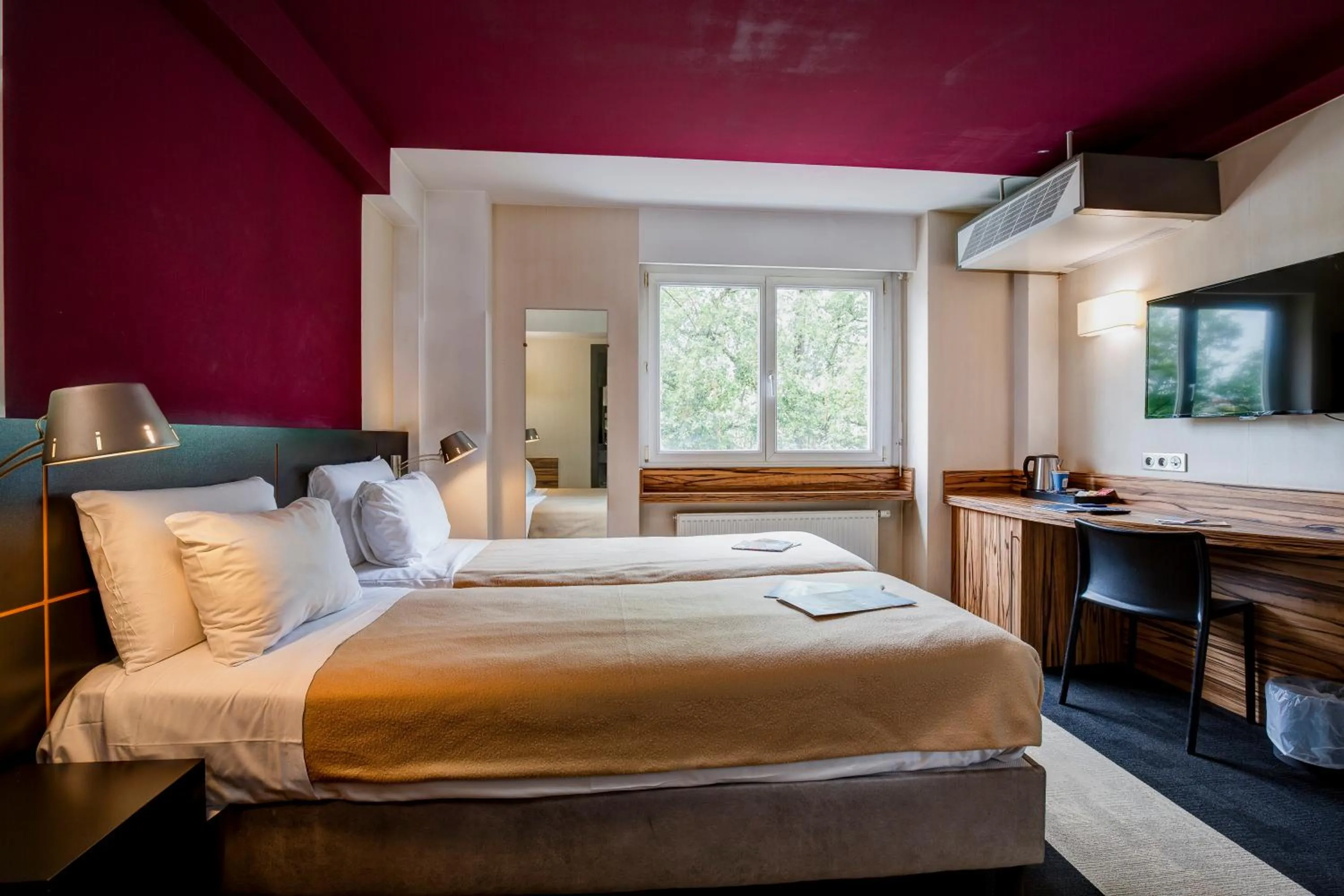 Bed in Kyriad Montbeliard Sochaux