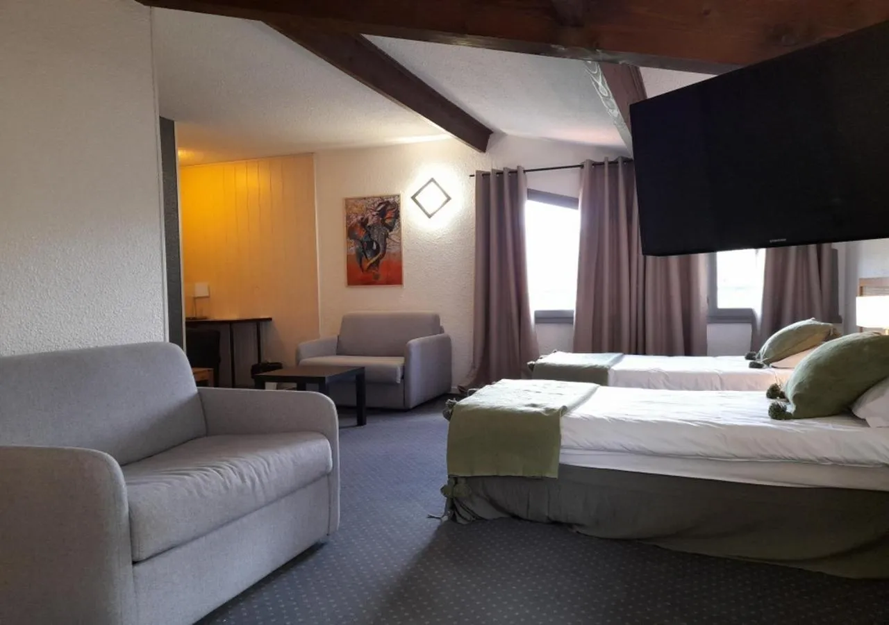 Bed in Les Jardins de L'Ocean - Climatisé