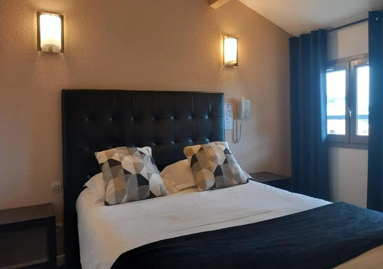 Bed in Les Jardins de L'Ocean - Climatisé