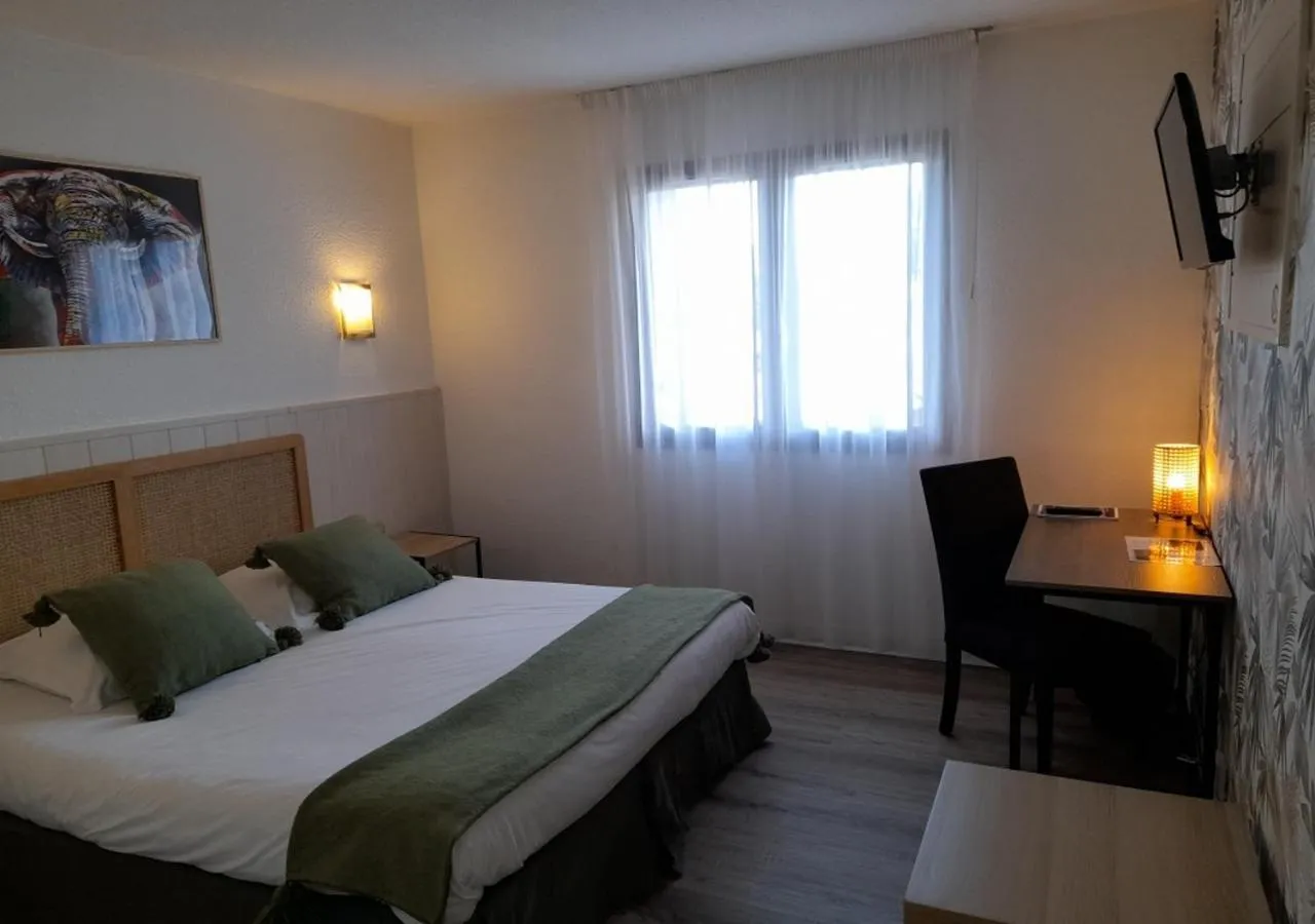 Bed in Les Jardins de L'Ocean - Climatisé