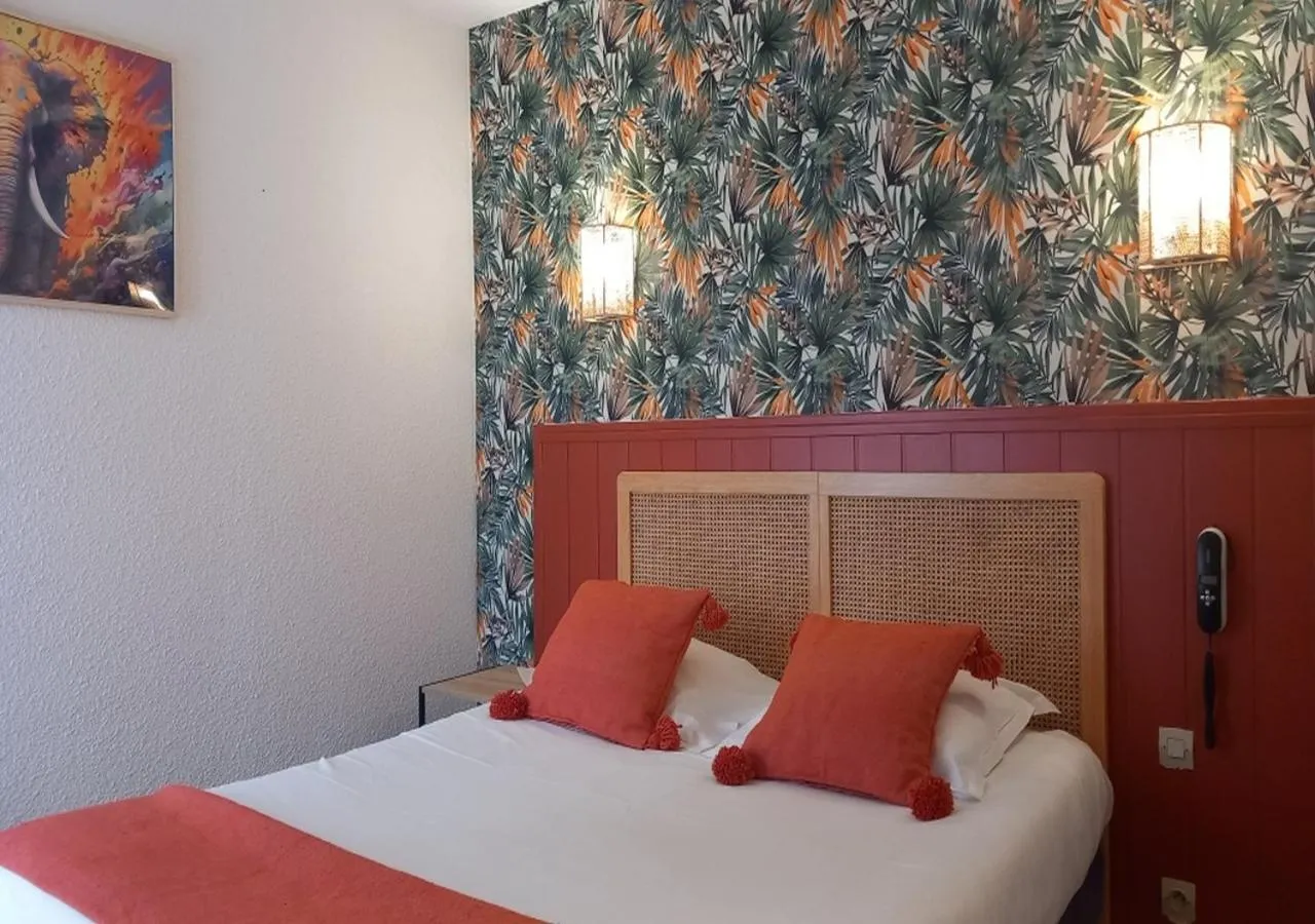 Bed in Les Jardins de L'Ocean - Climatisé