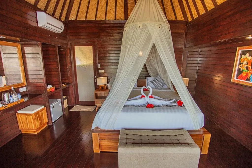 Bed in Ocean Paradise Cottage