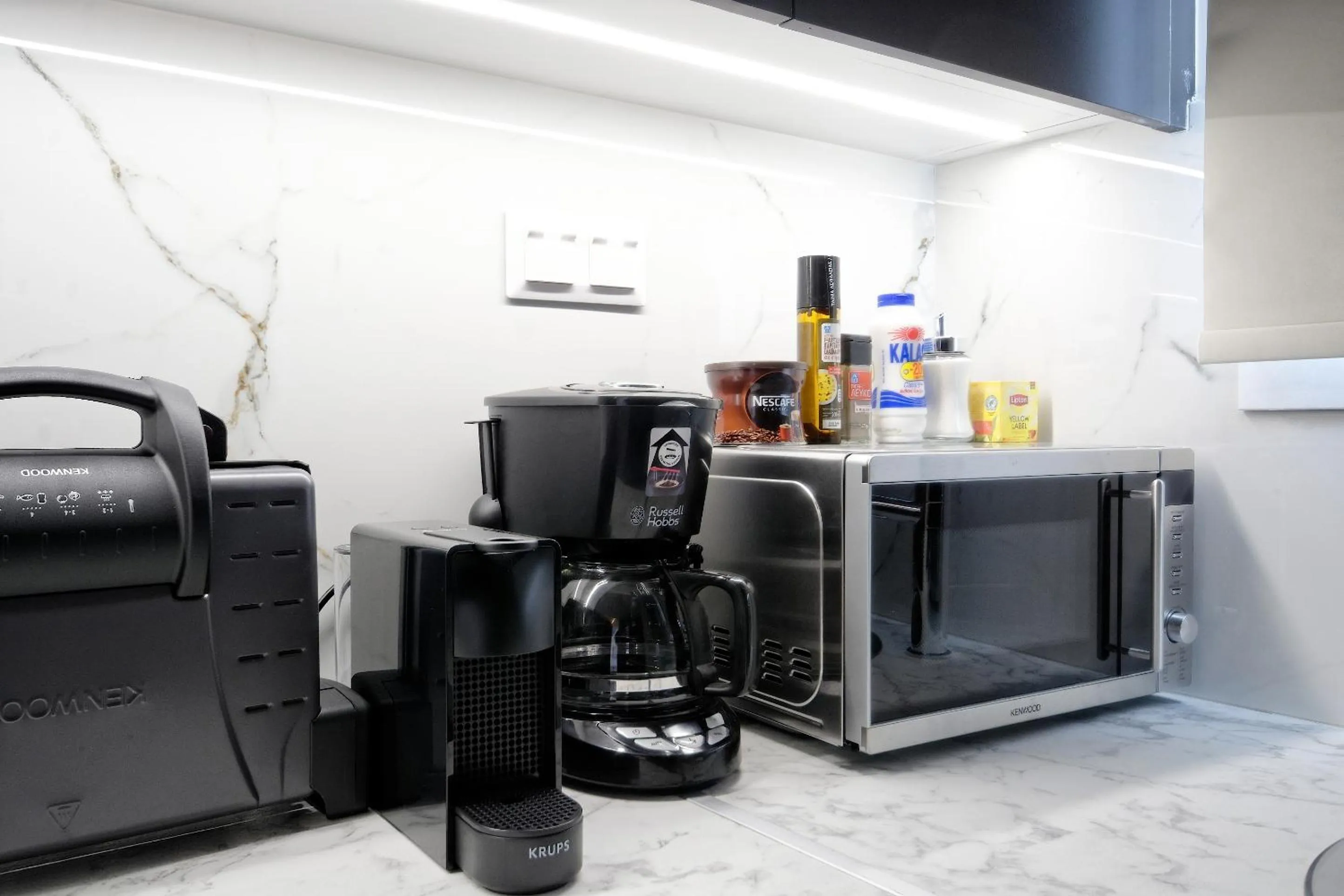 Coffee/tea facilities in Odyssey Residence