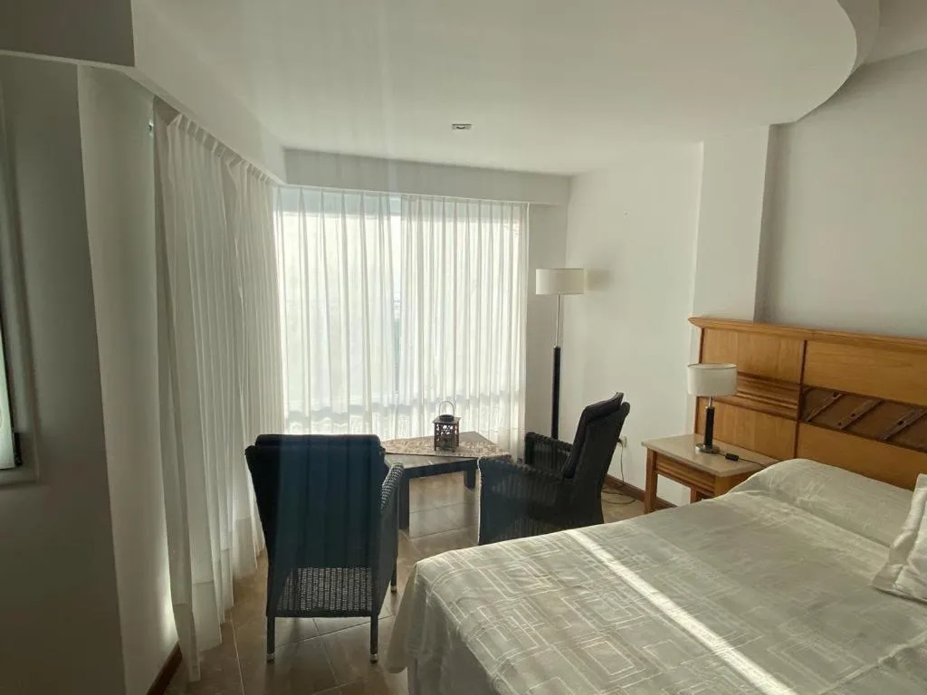 Bed in Costanera Mar Hotel & Suites