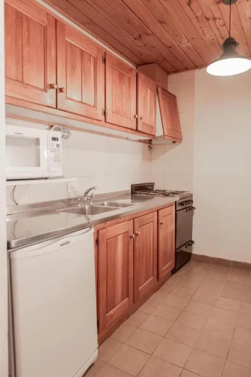 Kitchen or kitchenette in Hostería del Cerro