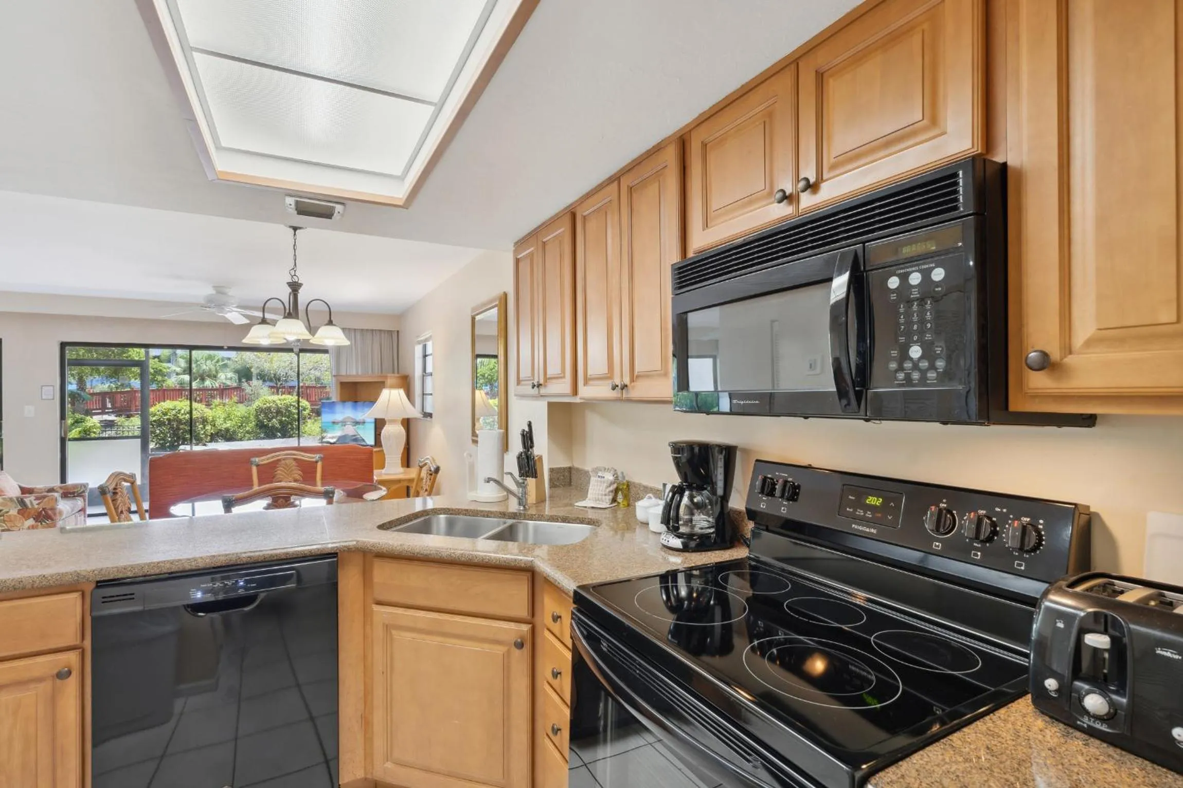 Kitchen or kitchenette in Park Shore Resort by Mike Z Rentals