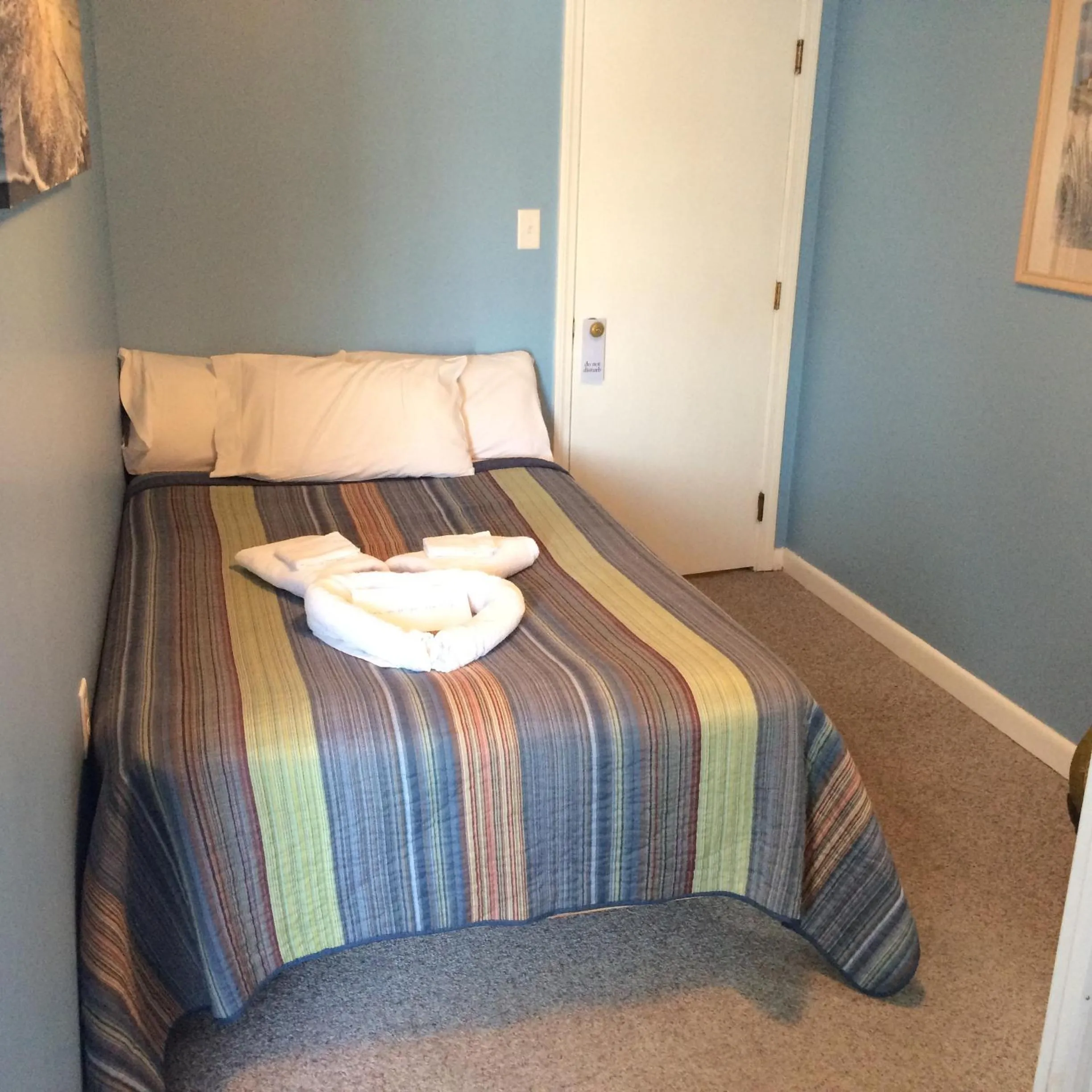 Bed in The New Oceanic Inn