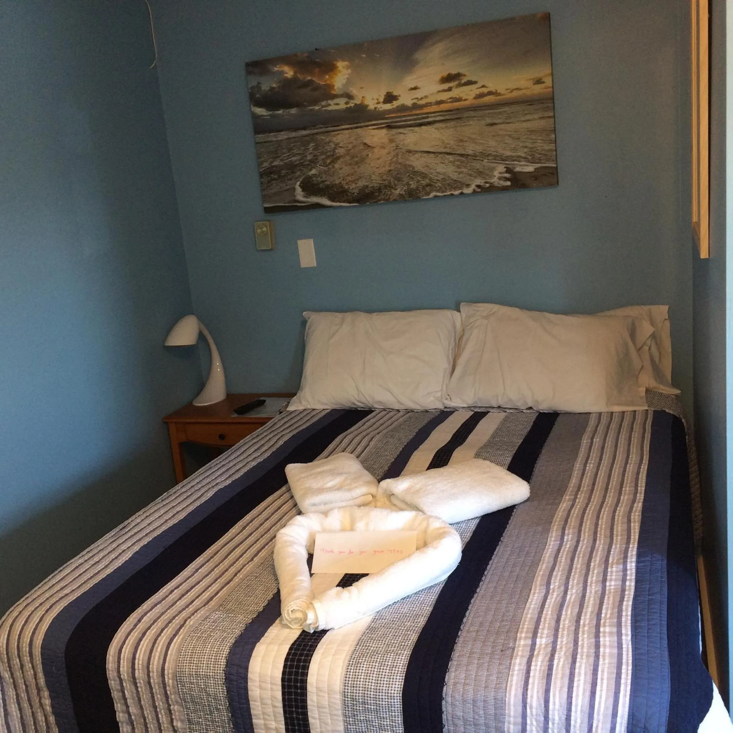 Bed in The New Oceanic Inn