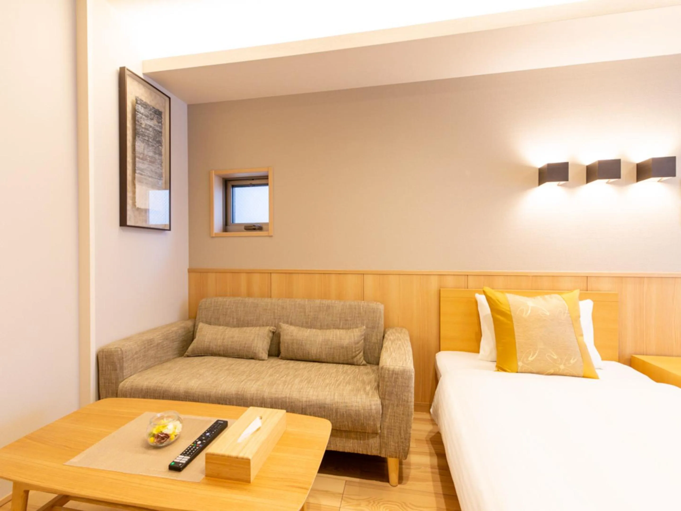 Photo of the whole room, Bed in GRAND BASE Hiroshima Hikarimachi