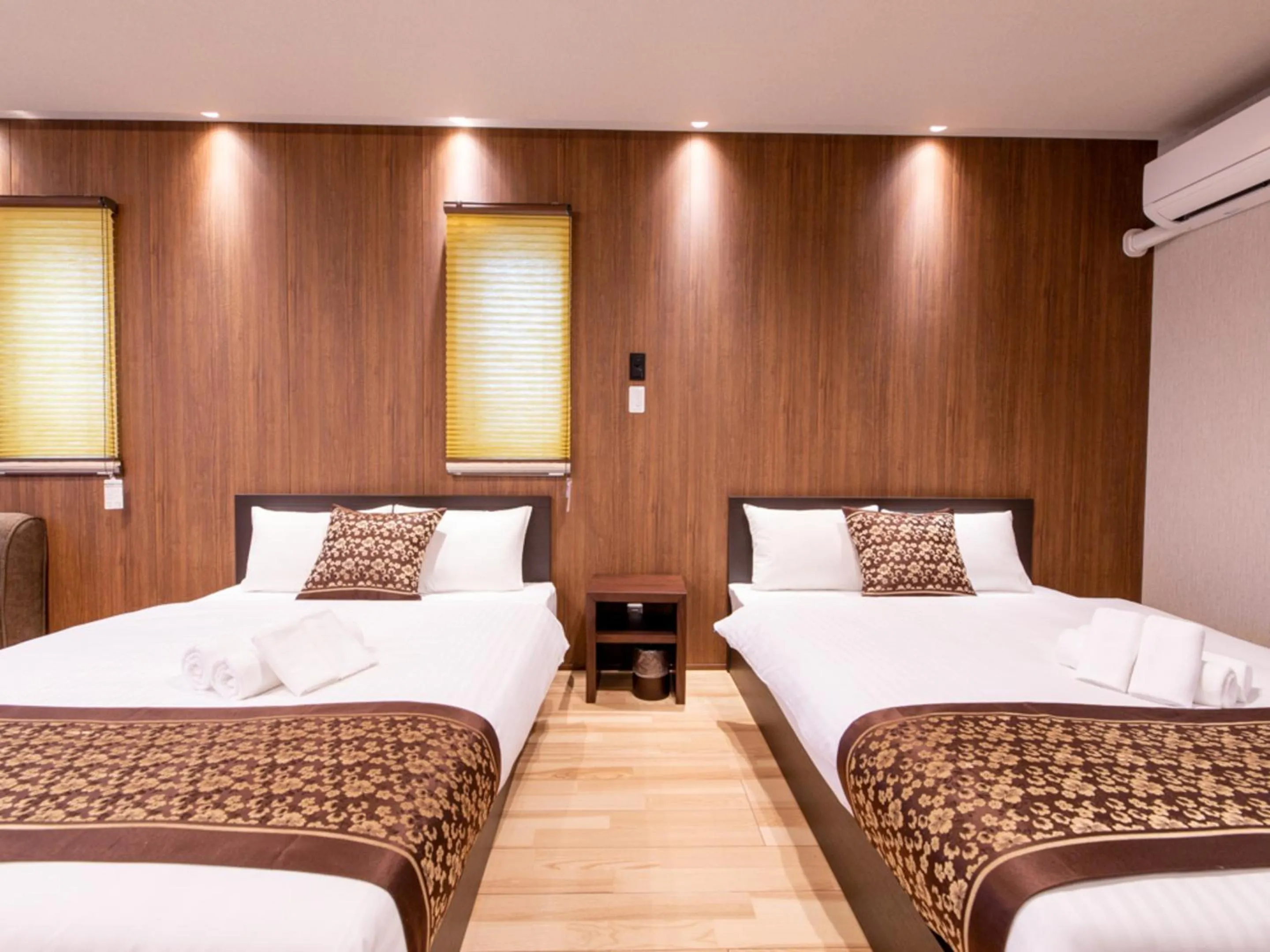 Bed in GRAND BASE Hiroshima Hikarimachi