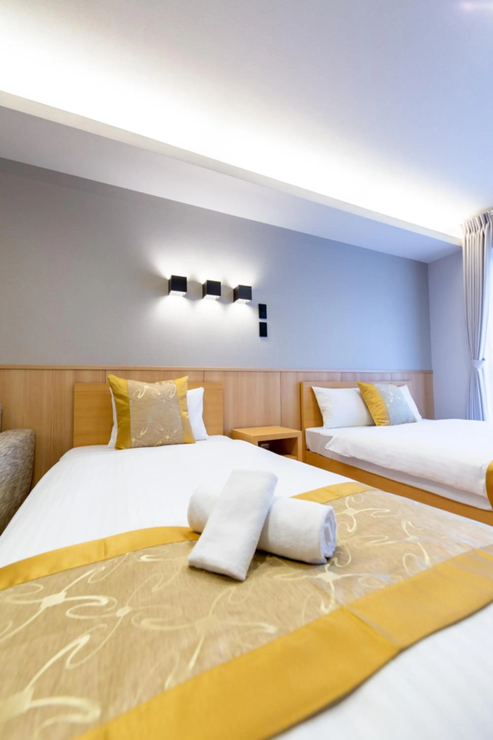 Photo of the whole room, Bed in GRAND BASE Hiroshima Hikarimachi