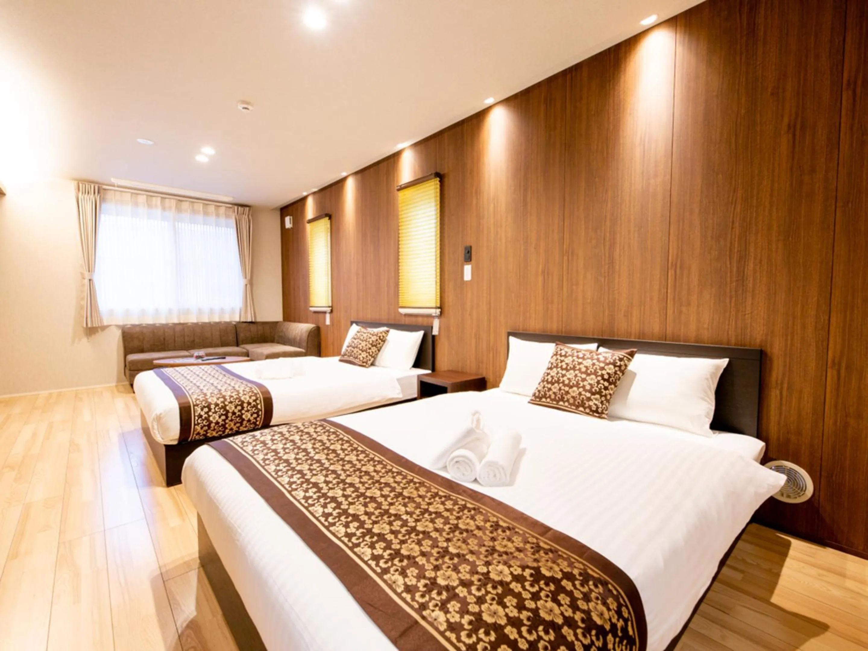 Bed in GRAND BASE Hiroshima Hikarimachi