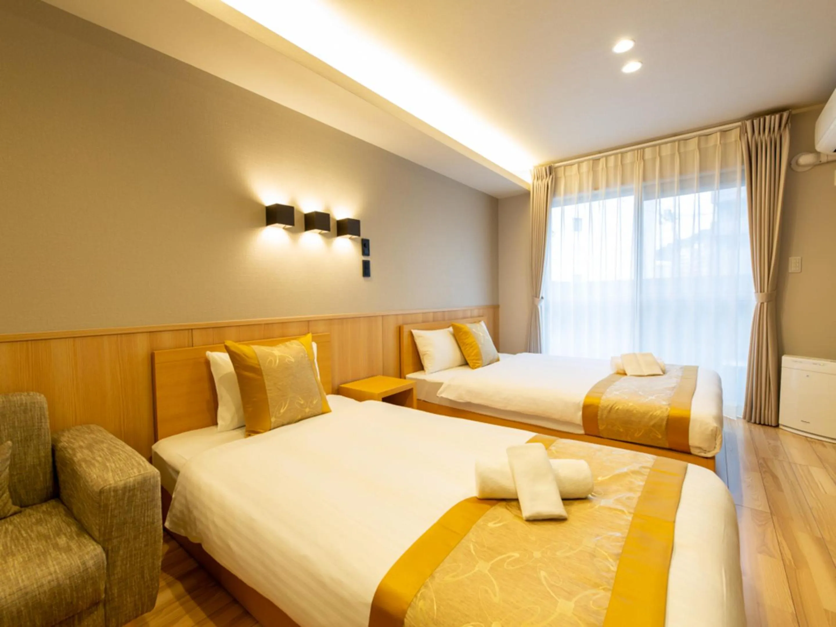 Bed in GRAND BASE Hiroshima Hikarimachi