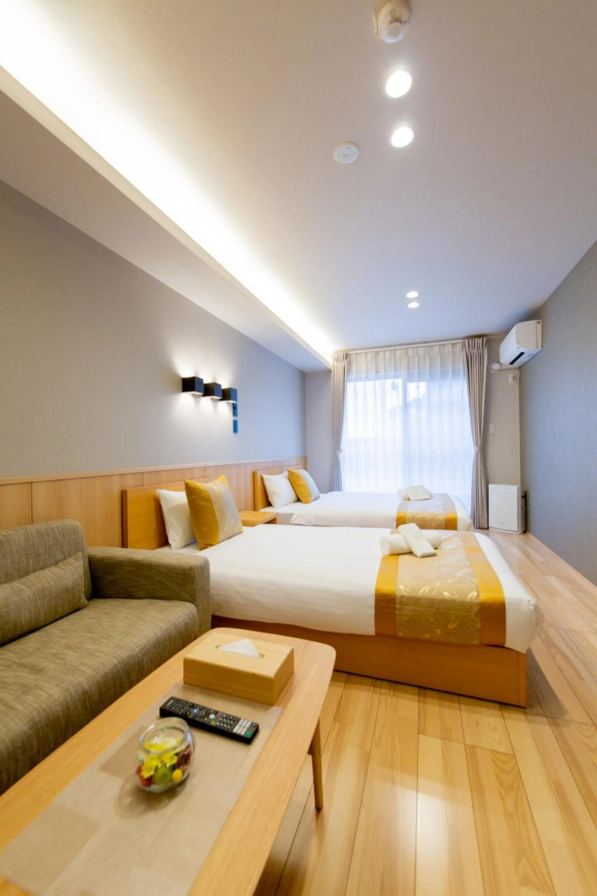 Photo of the whole room, Bed in GRAND BASE Hiroshima Hikarimachi