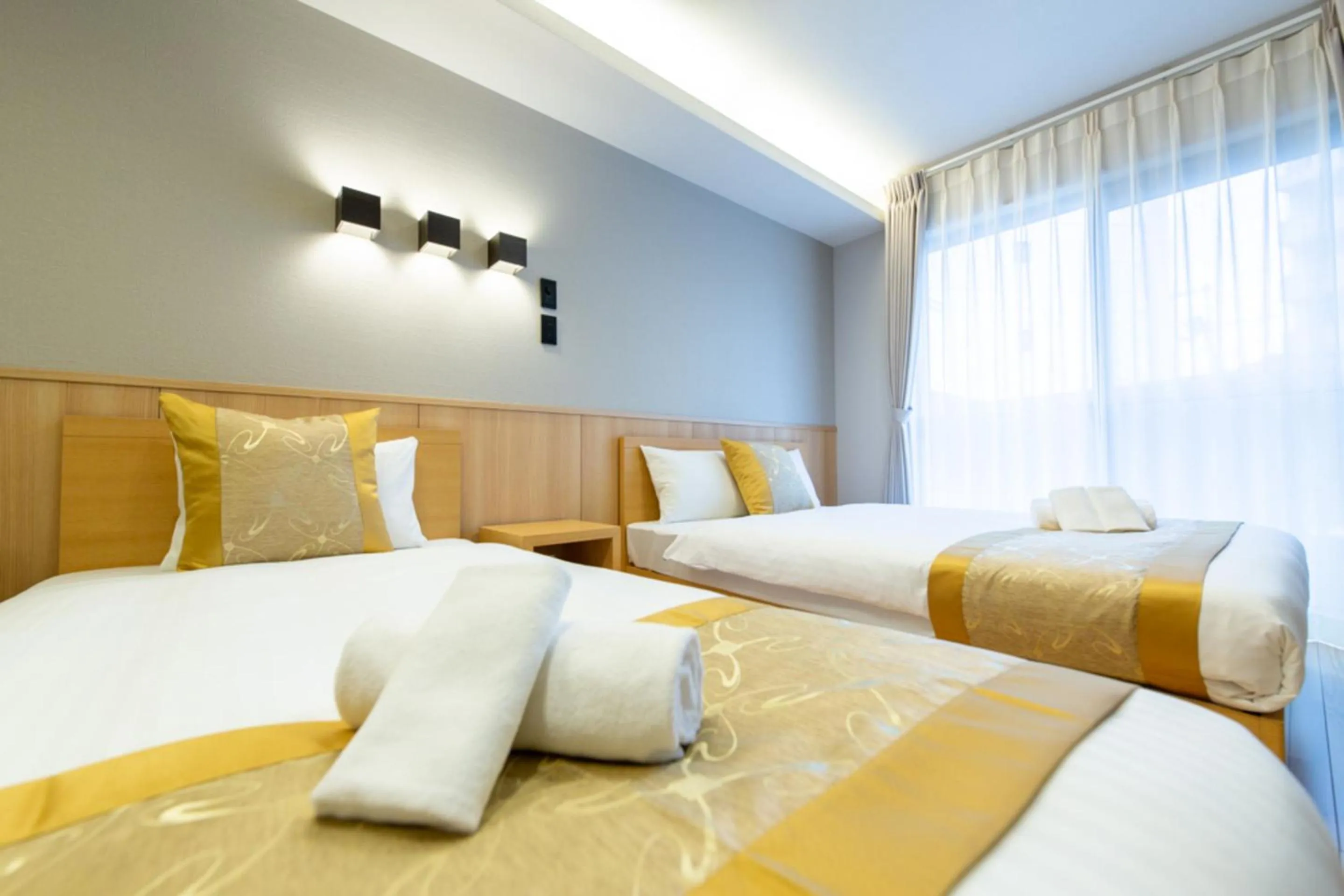 Photo of the whole room, Bed in GRAND BASE Hiroshima Hikarimachi