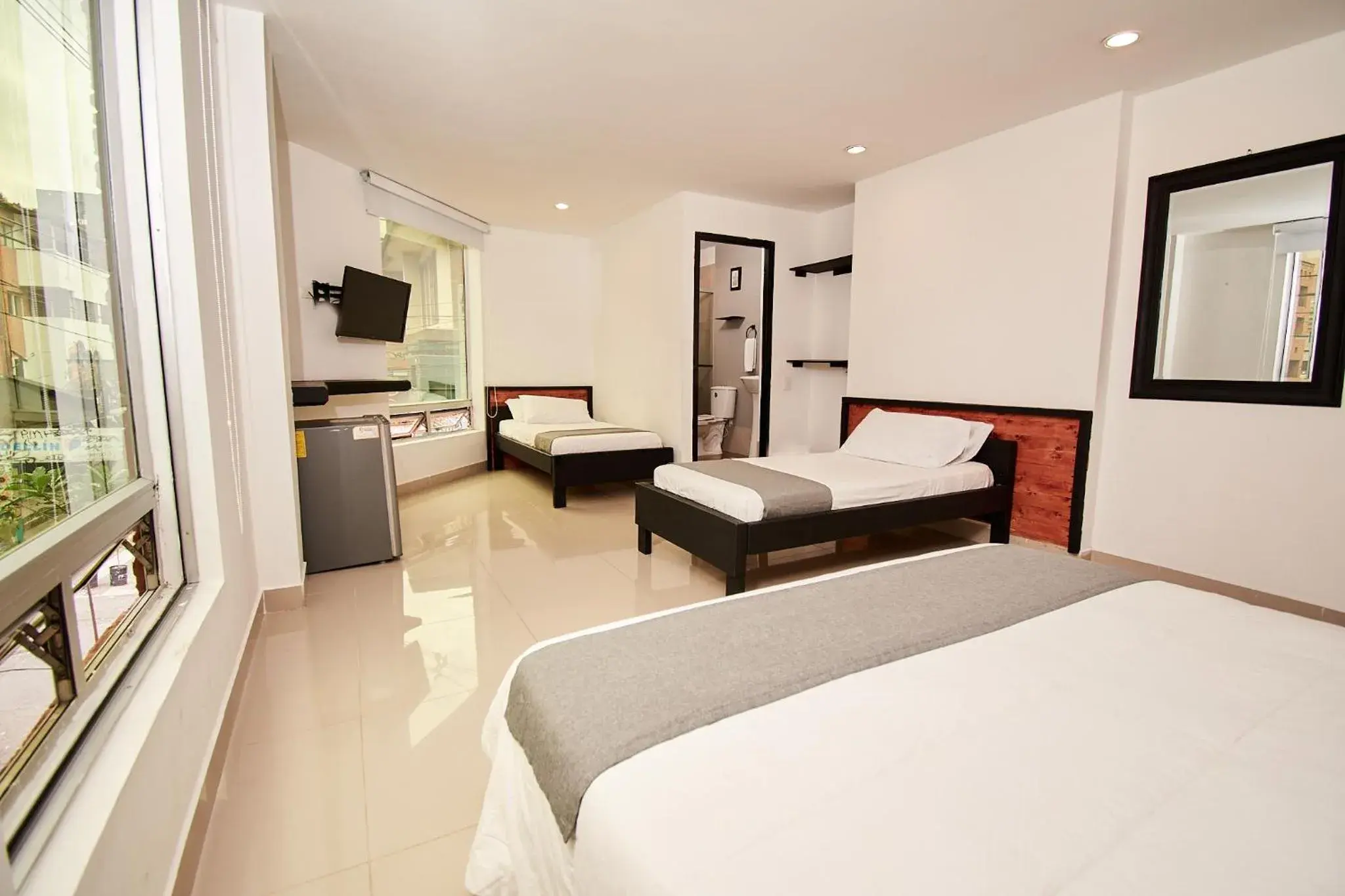 Superior Triple Room in Hotel Tik Medellin Superior Triple Room in Hotel Tik Medellin