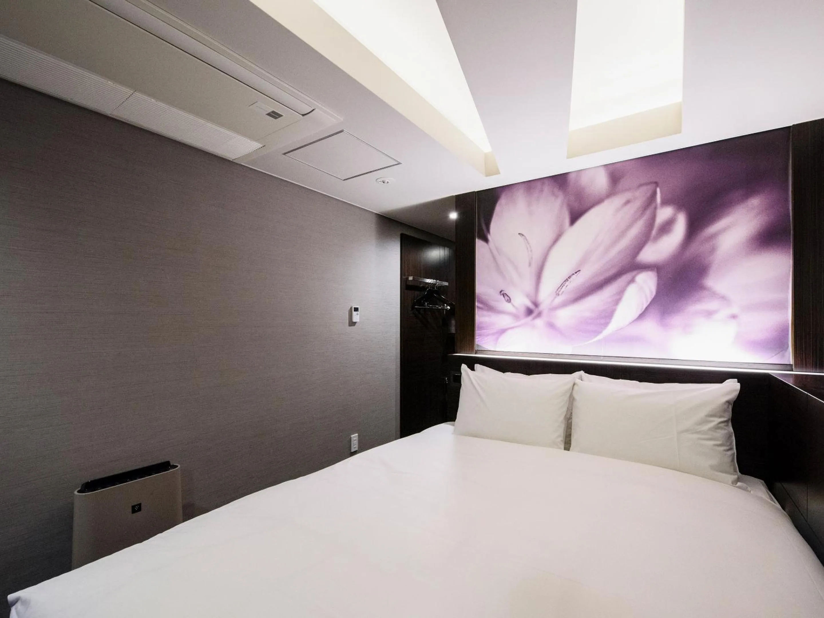 Bed in Meguroholic Hotel