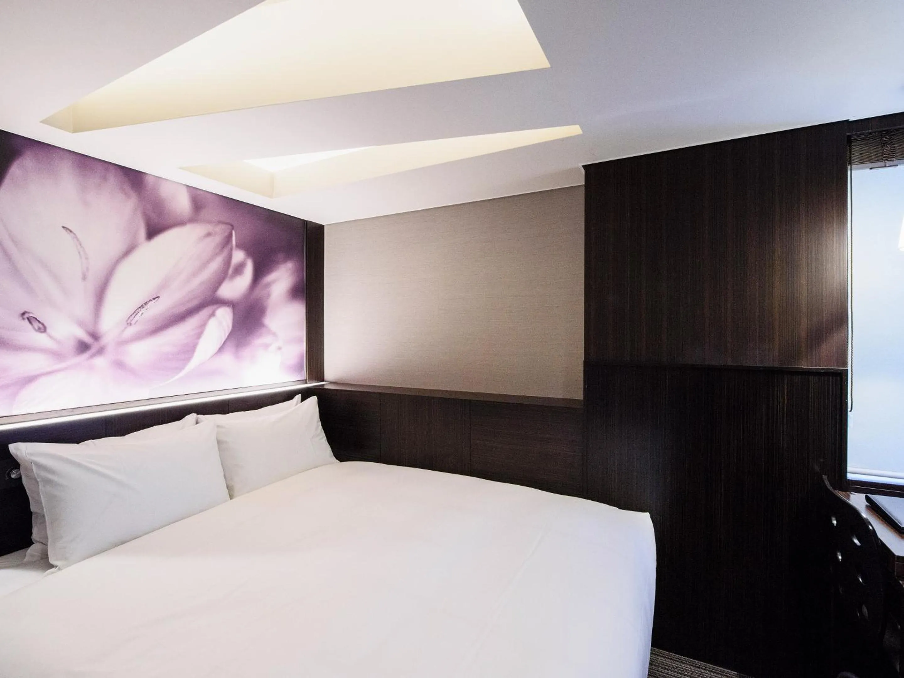 Bed in Meguroholic Hotel