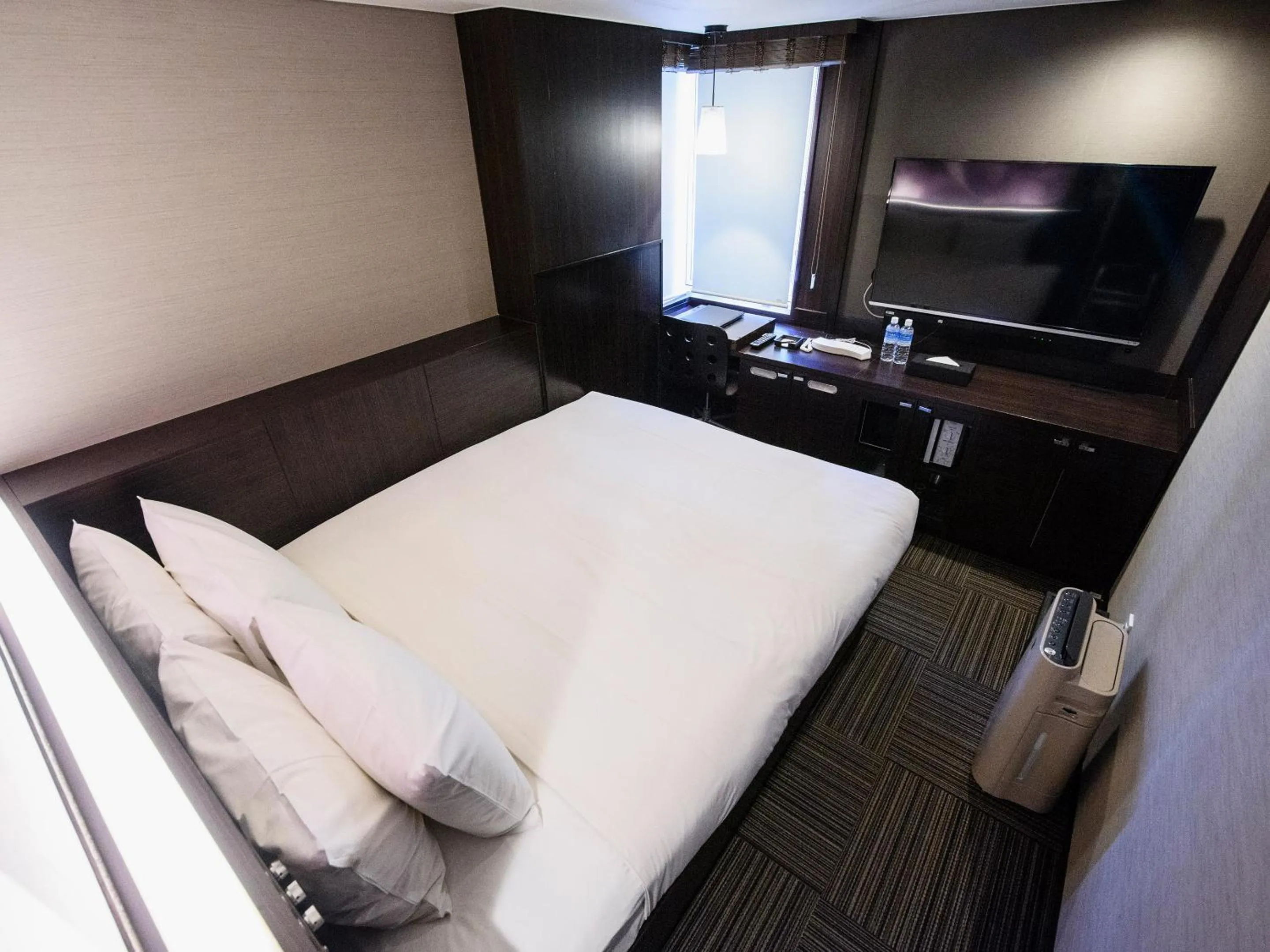 Bed in Meguroholic Hotel