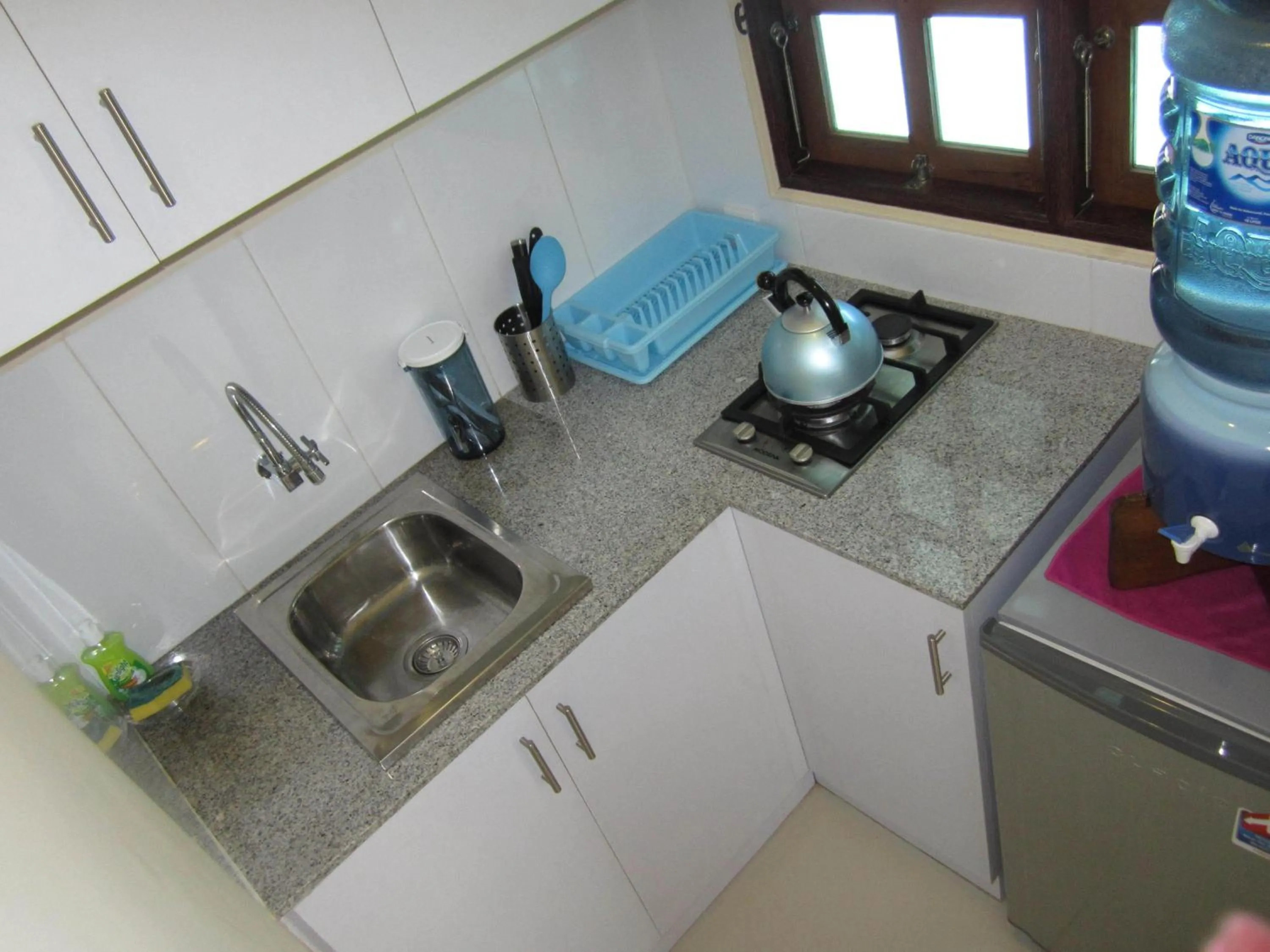 Kitchen or kitchenette in Lovina Oasis Hotel