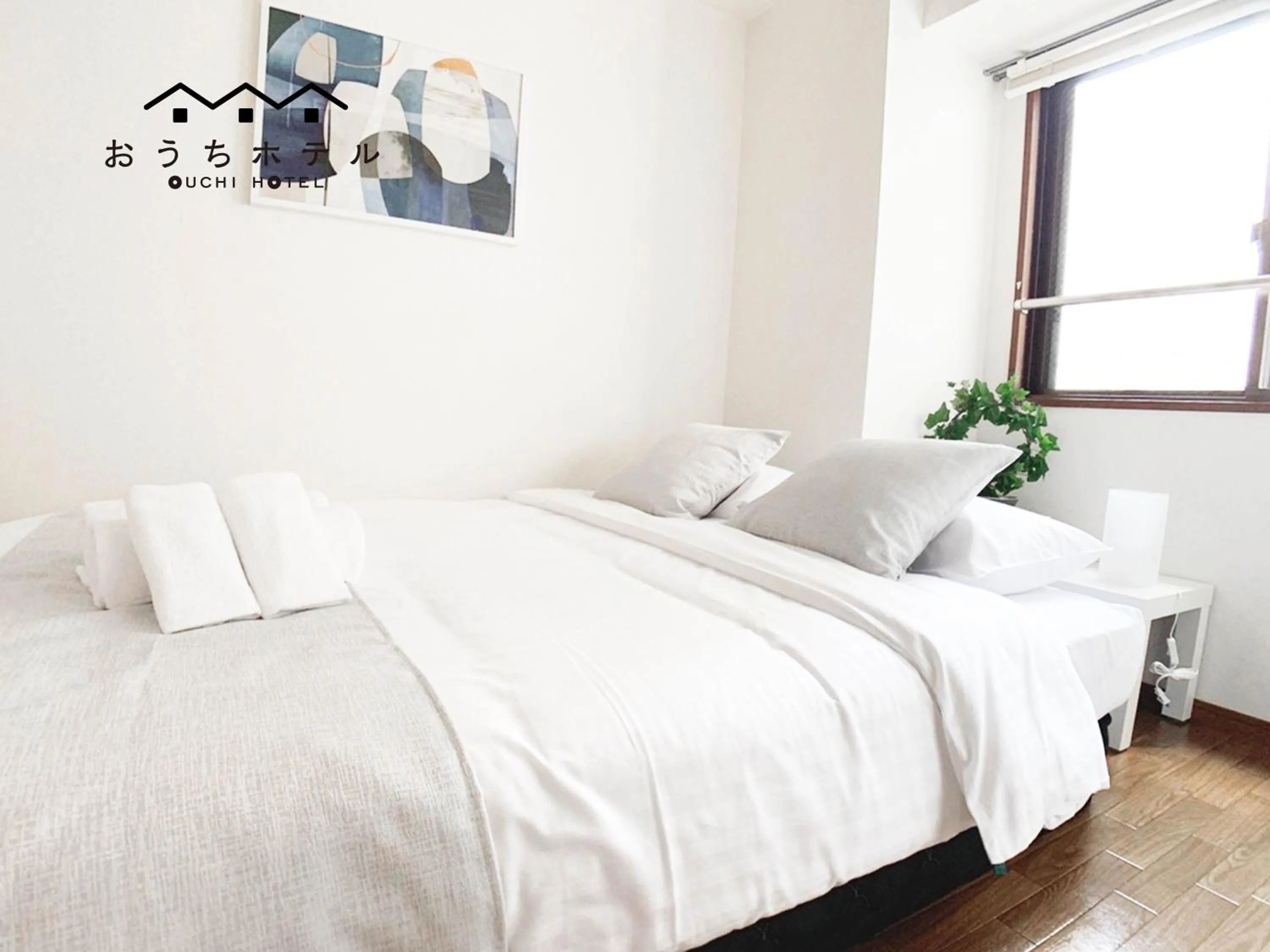 Bed in OUCHI HOTEL Dambara