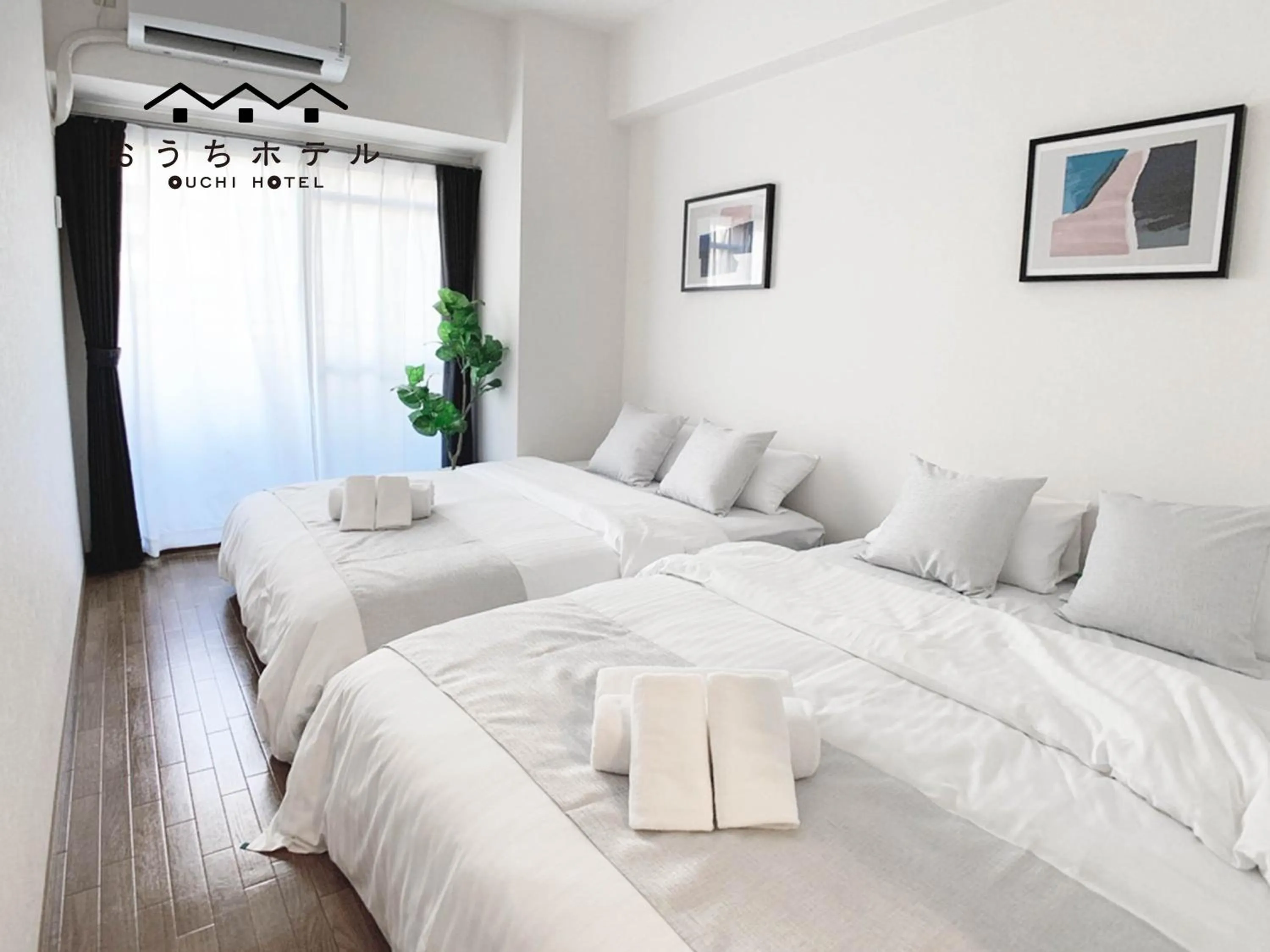 Bed in OUCHI HOTEL Dambara