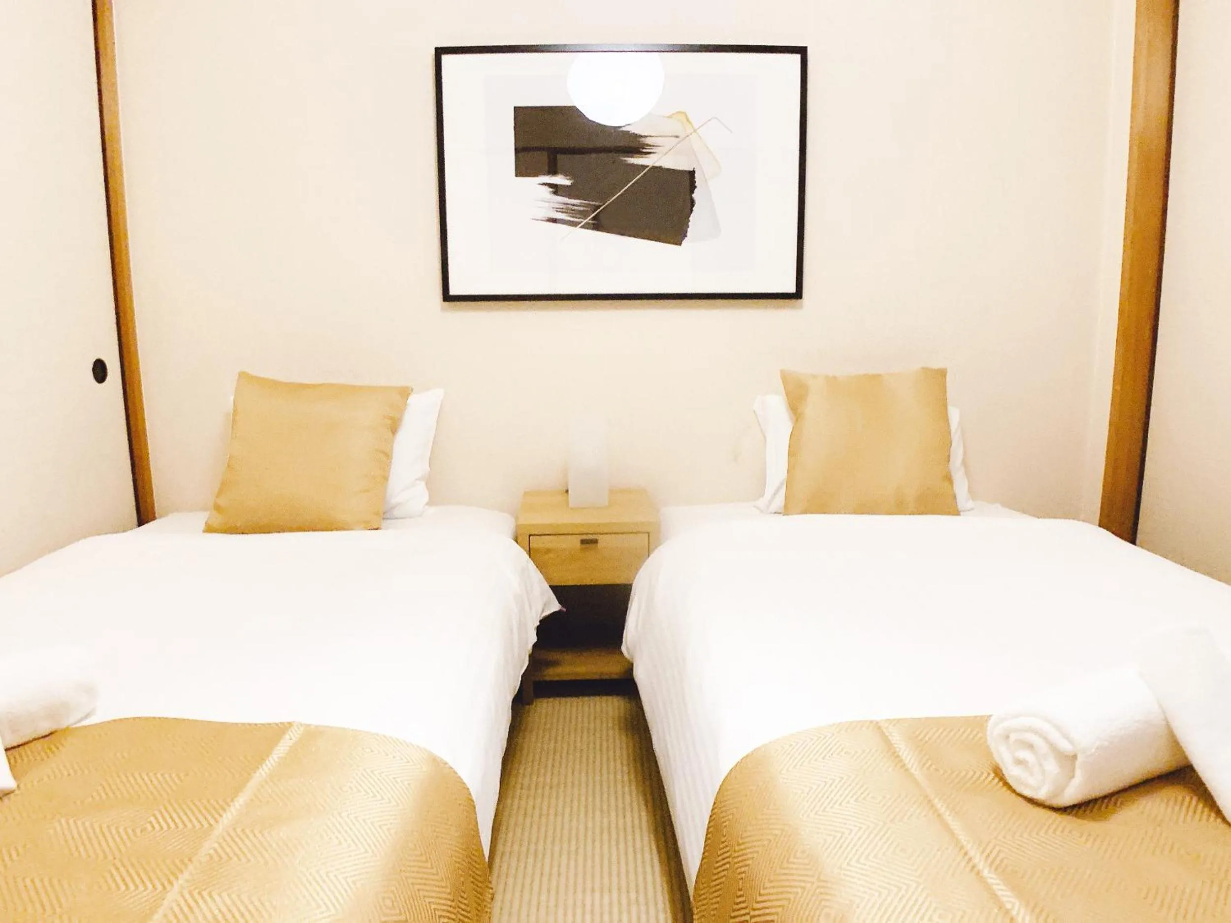 Bed in OUCHI HOTEL Dambara