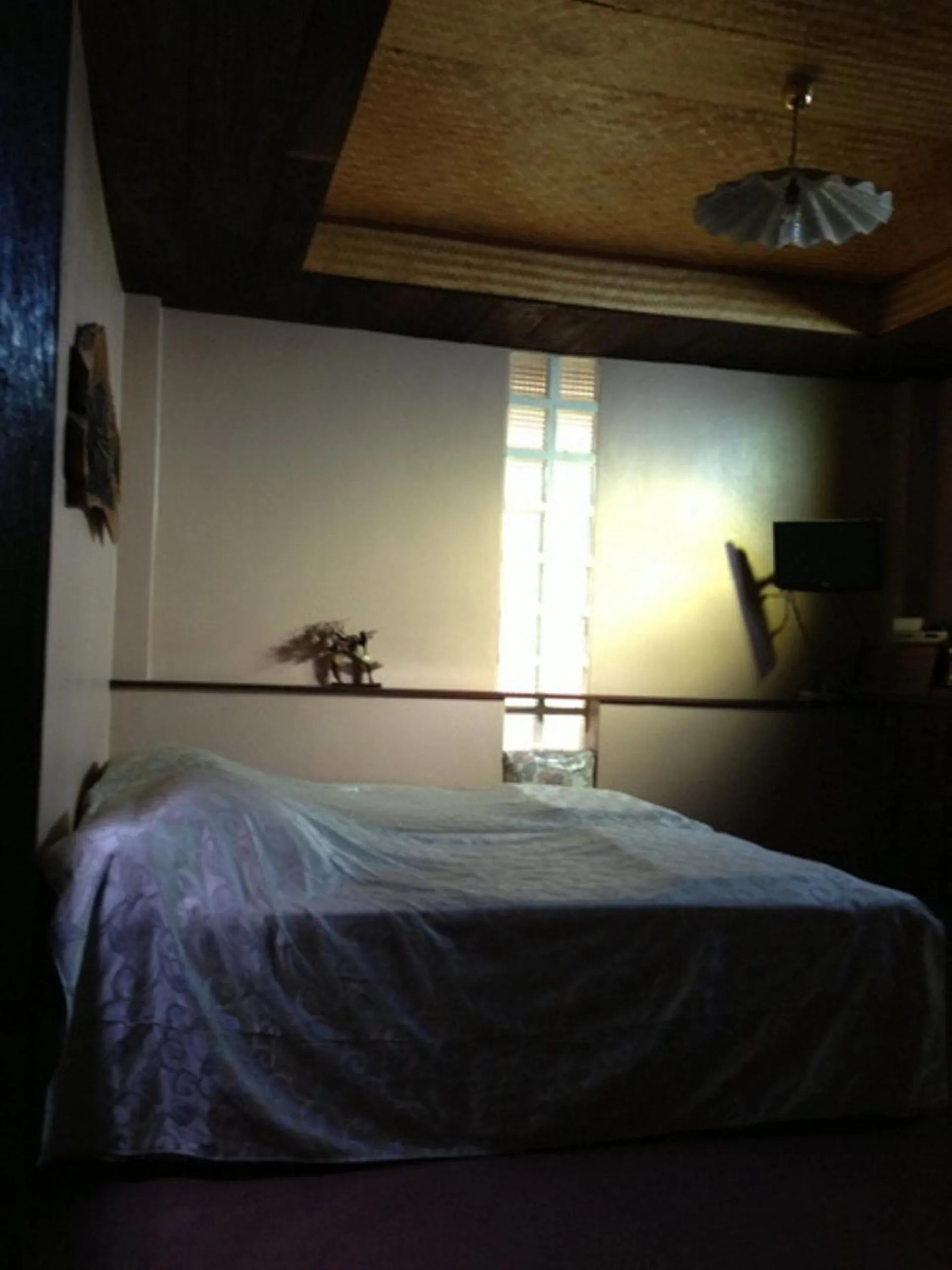 Bed in Ayothaya Riverside House