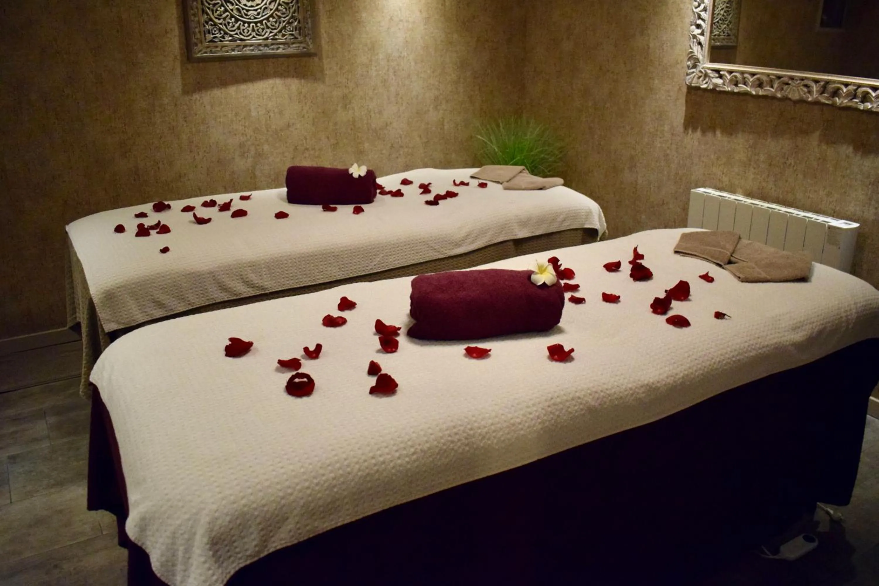 Bed in La Loggia Appart'Hôtel & Spa