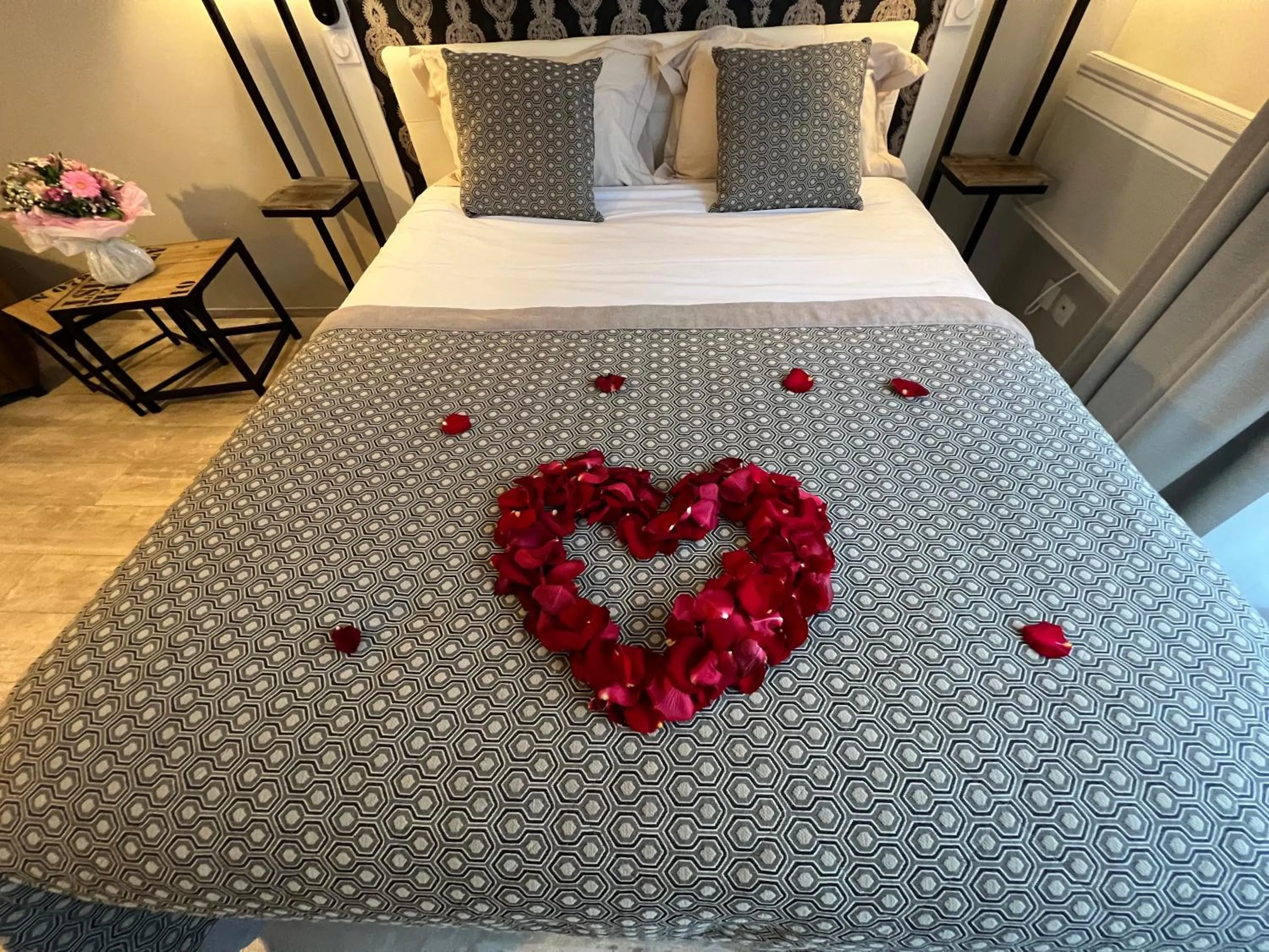 Bed in La Loggia Appart'Hôtel & Spa