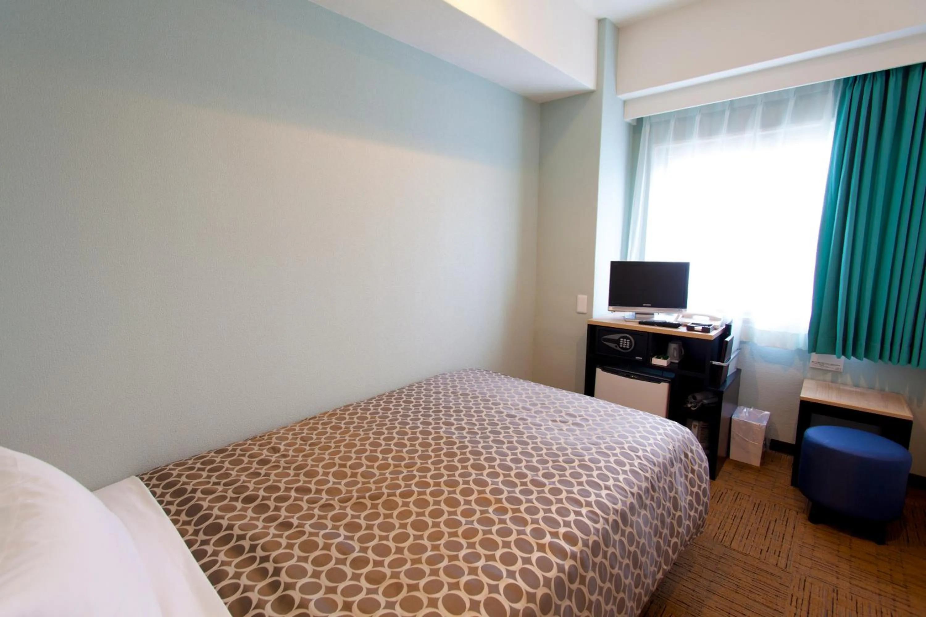 Photo of the whole room, Bed in Community & Spa Naha Central Hotel