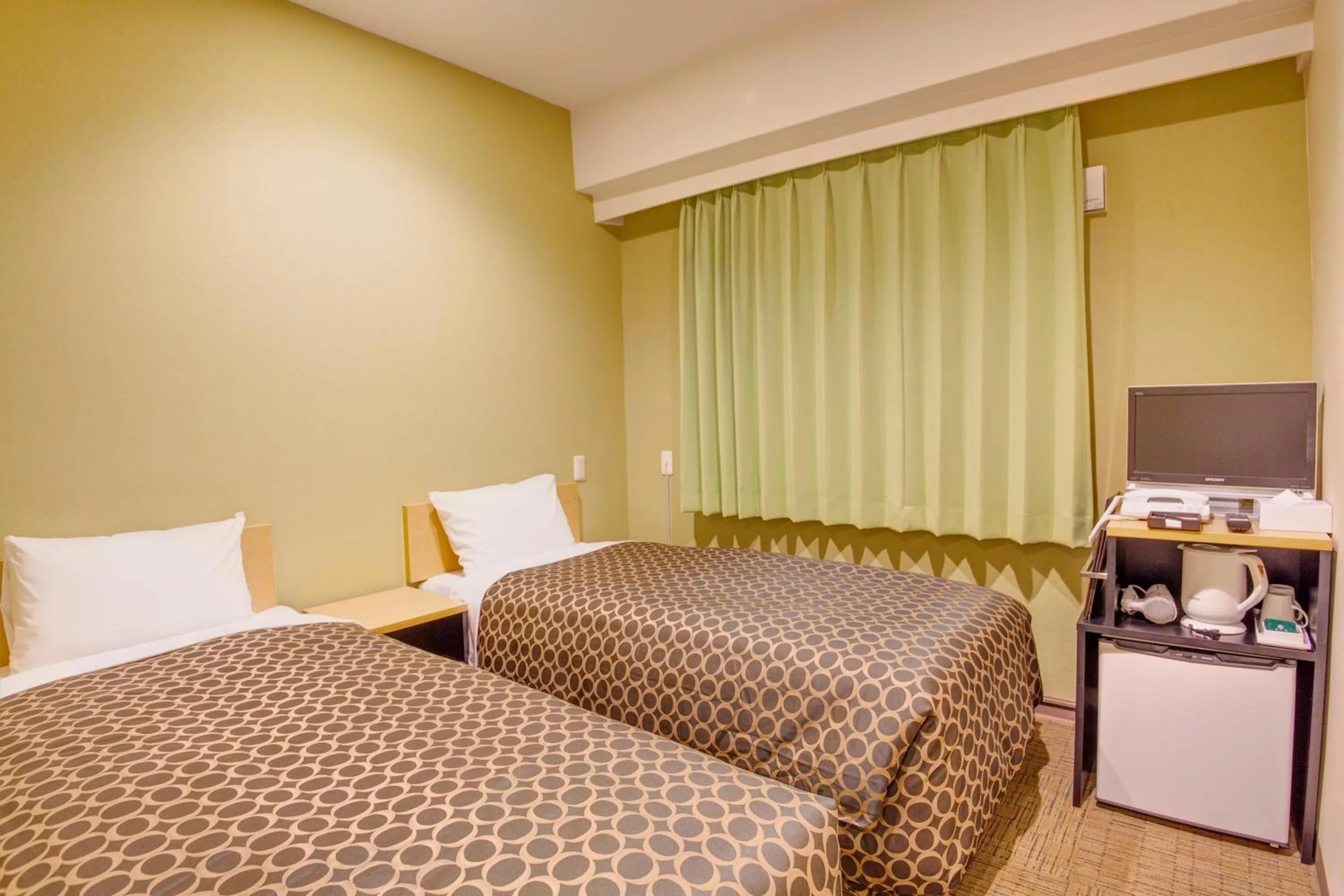 Photo of the whole room, Bed in Community & Spa Naha Central Hotel
